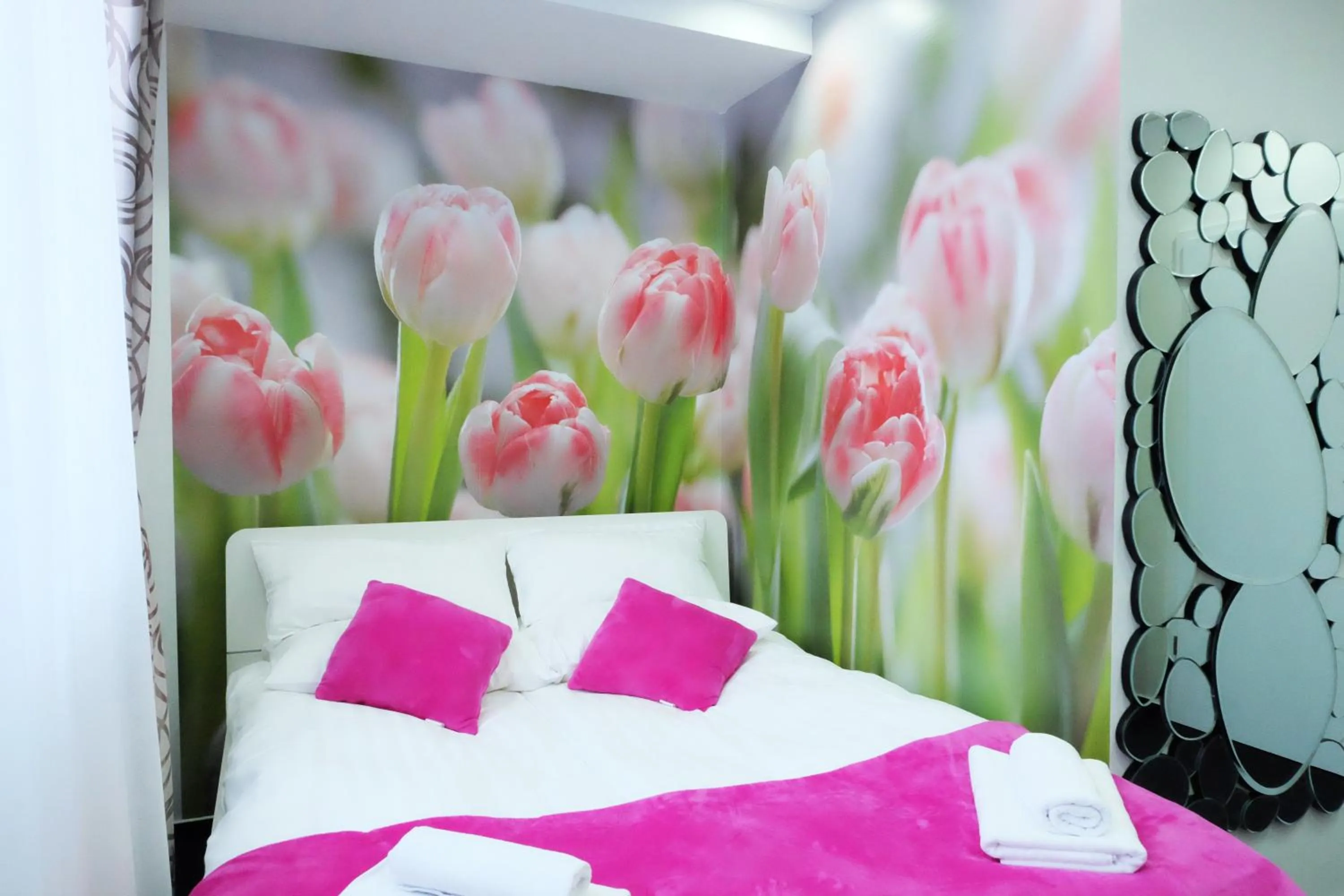 Bed in Luwiana Suites