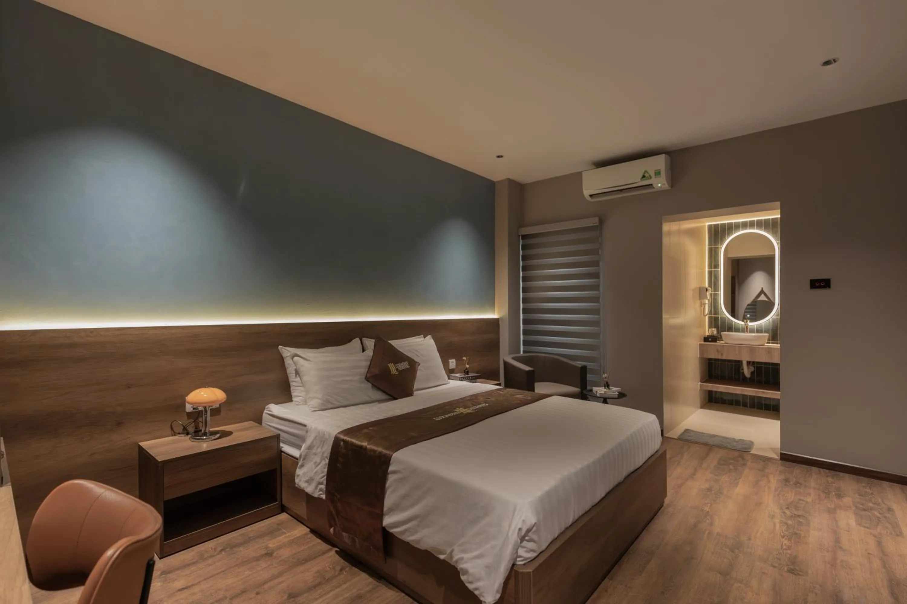 Bed in Luxhome Mekong Hotel