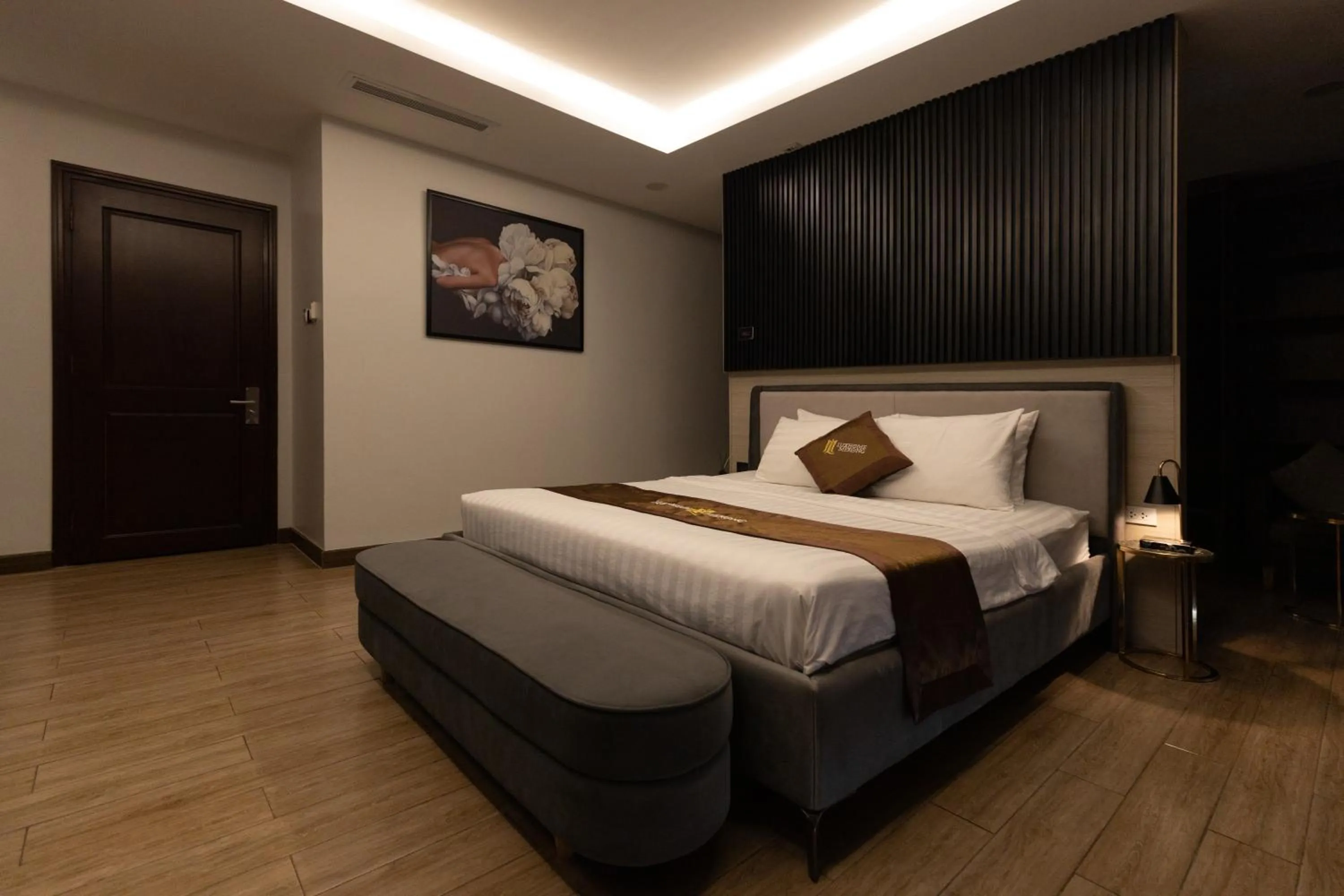 Bed in Luxhome Mekong Hotel