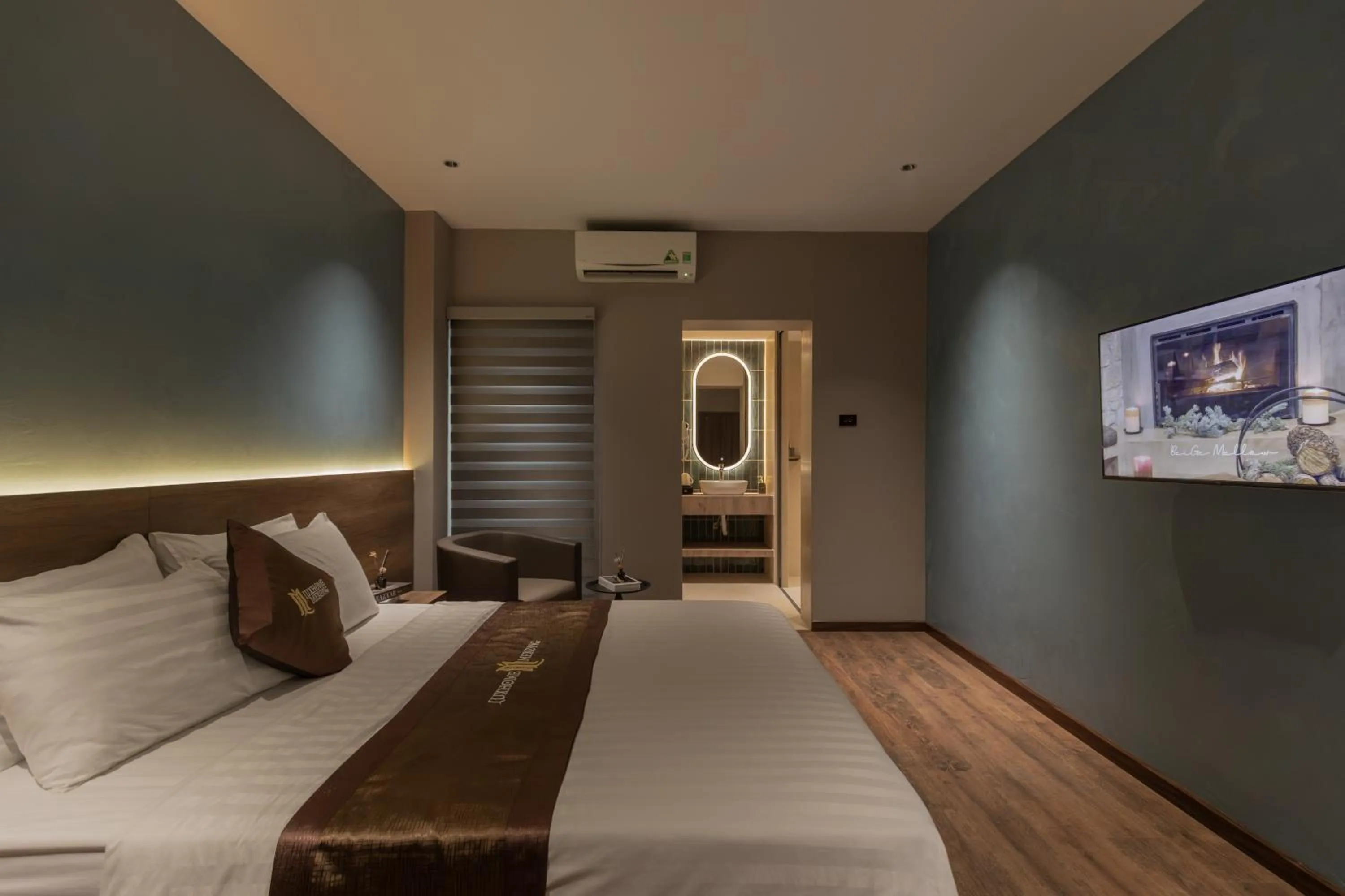 Bed in Luxhome Mekong Hotel