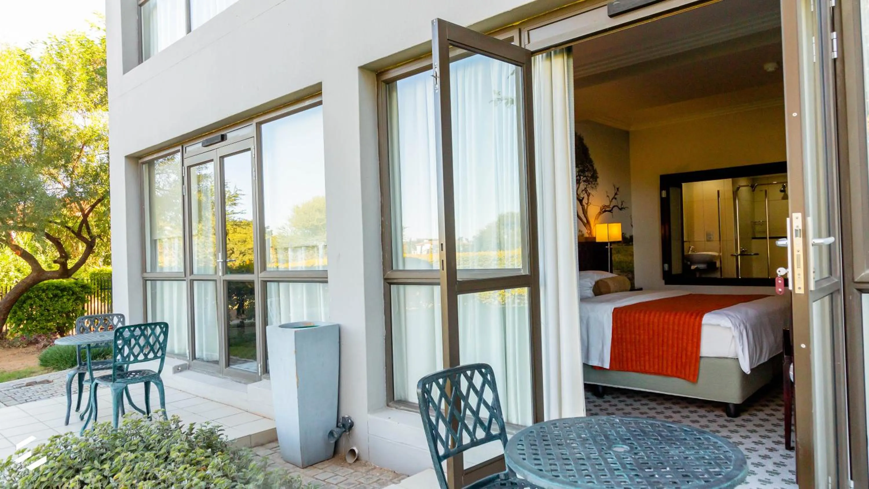 Patio, Bed in Phakalane Golf Estate Hotel & Convention Centre