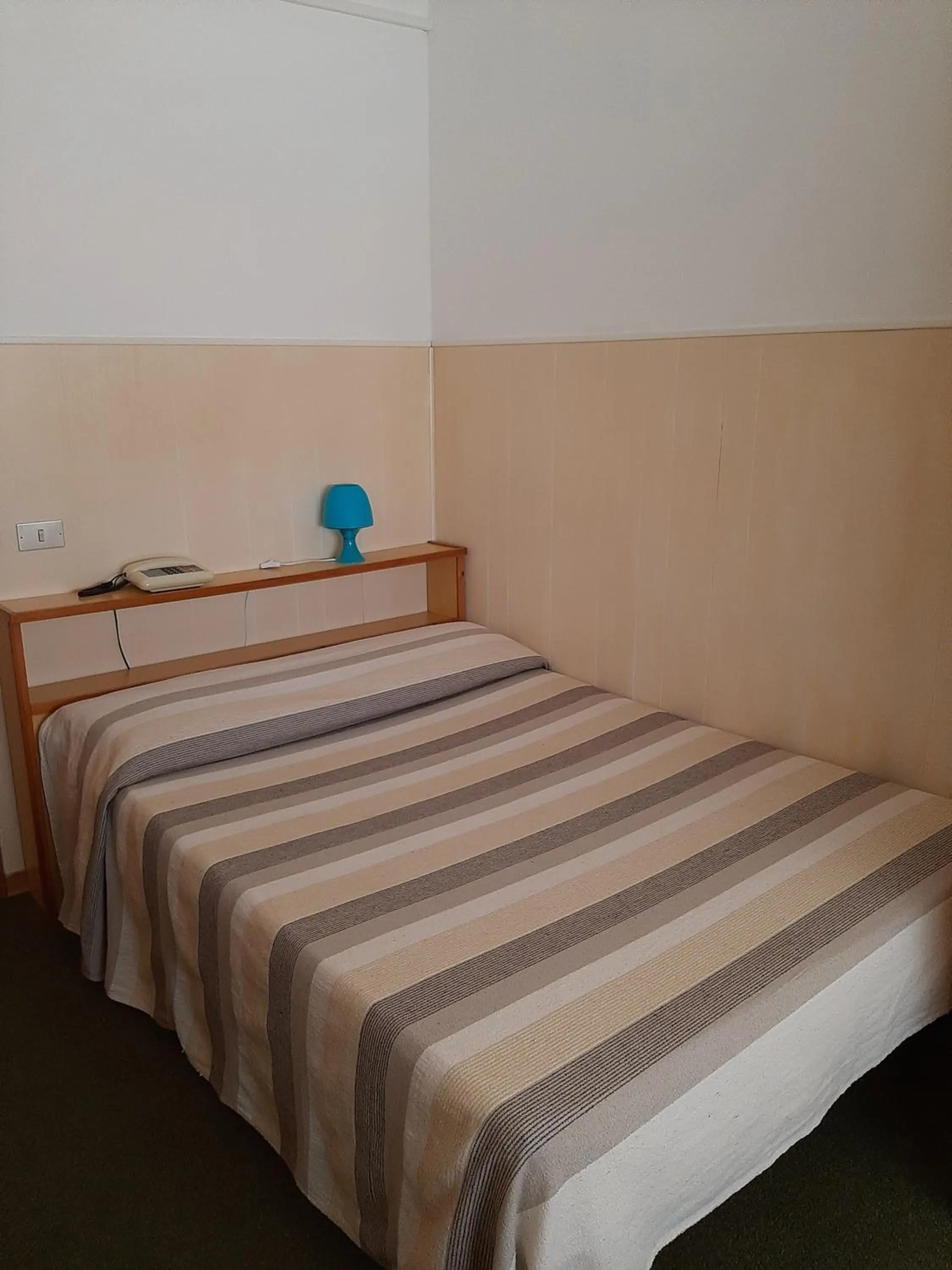 Bed in Hotel Cucciolo