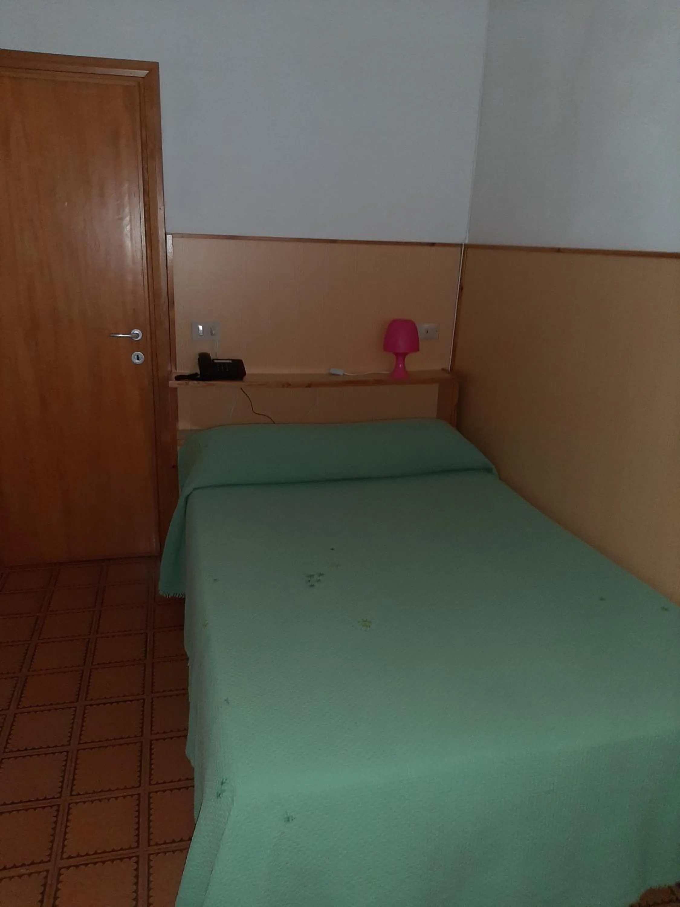 Bed in Hotel Cucciolo