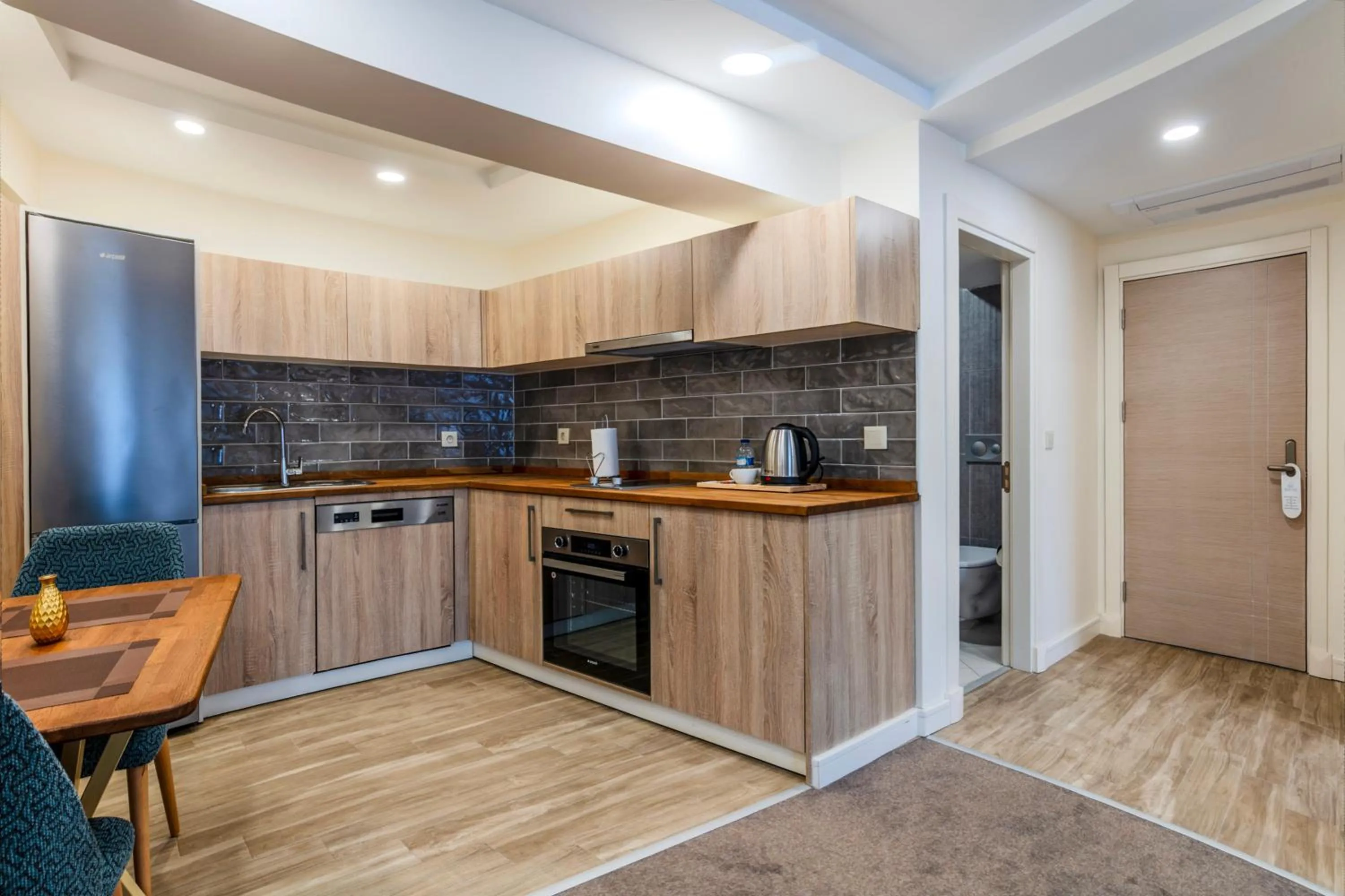 Kitchen or kitchenette in Roys Hotel & Suites