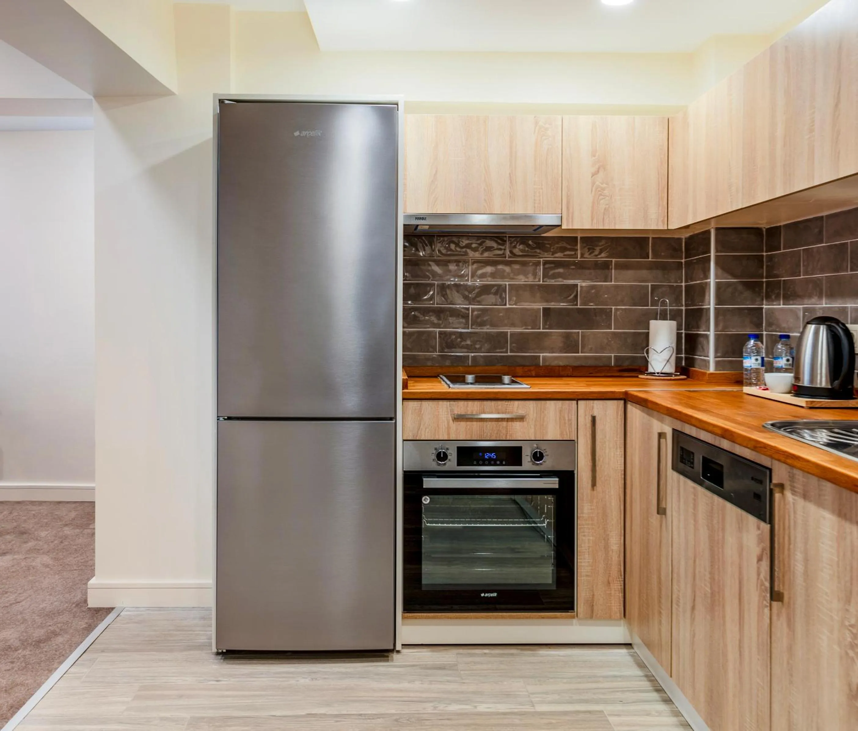Kitchen or kitchenette in Roys Hotel & Suites