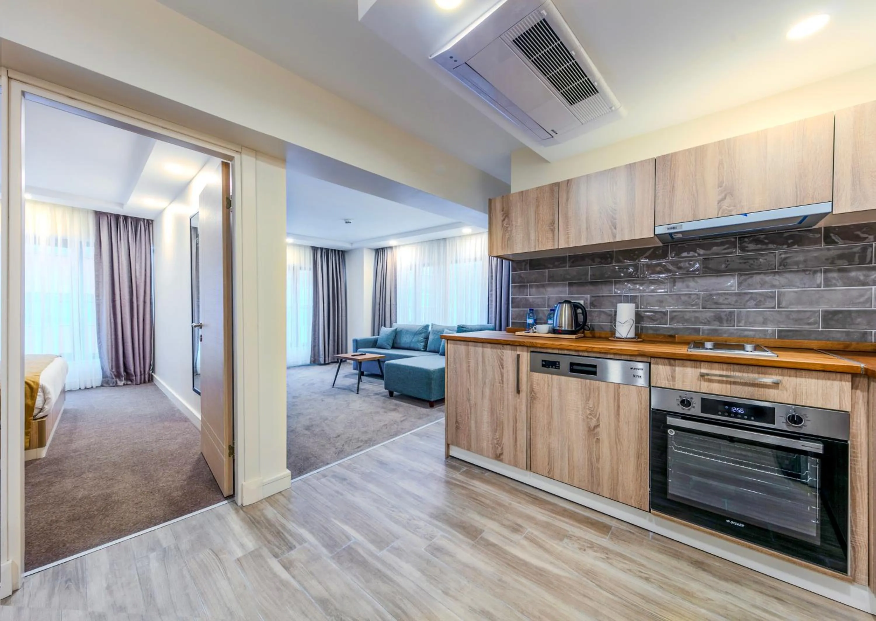 Bed in Roys Hotel & Suites