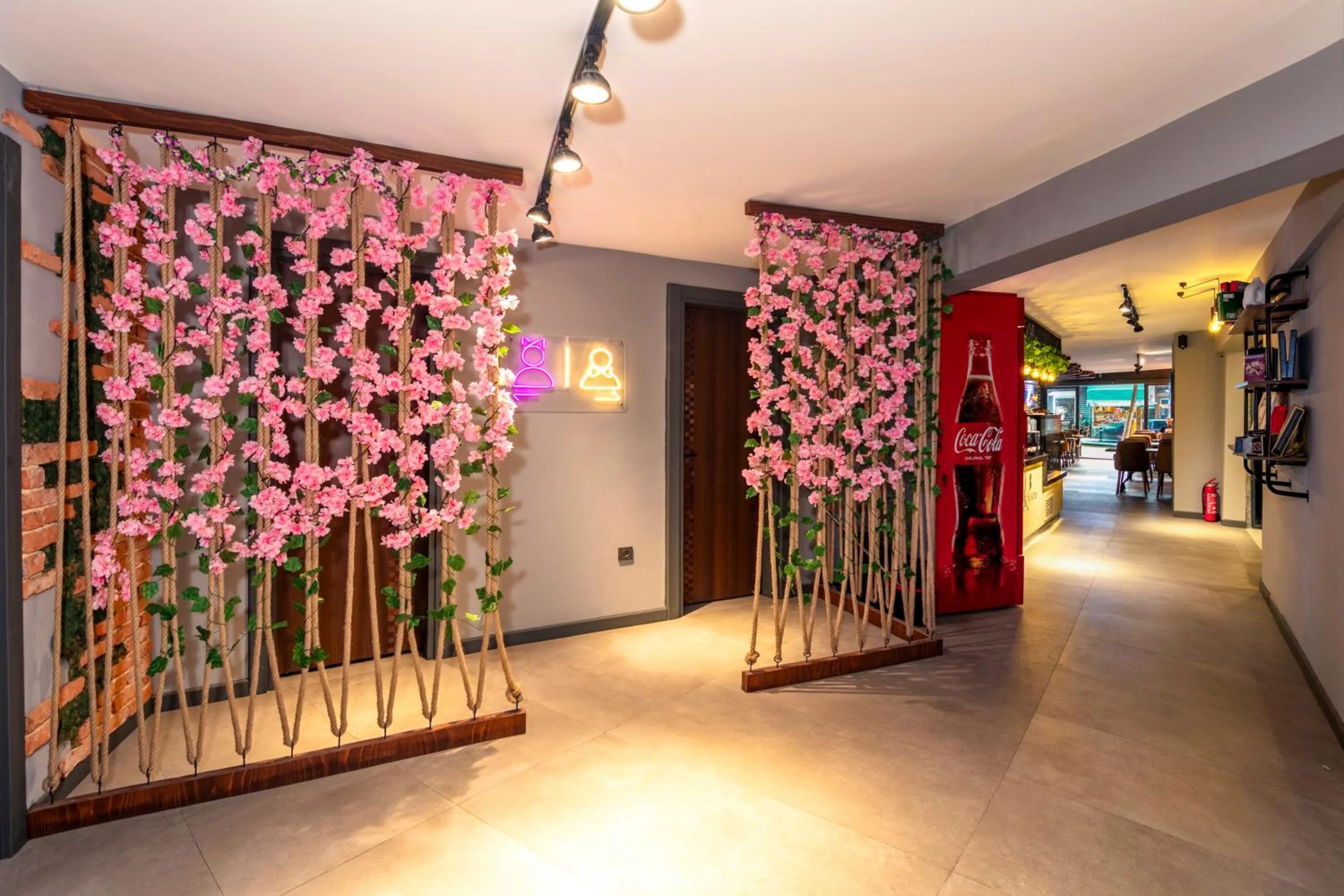 Toilet in Roys Hotel & Suites