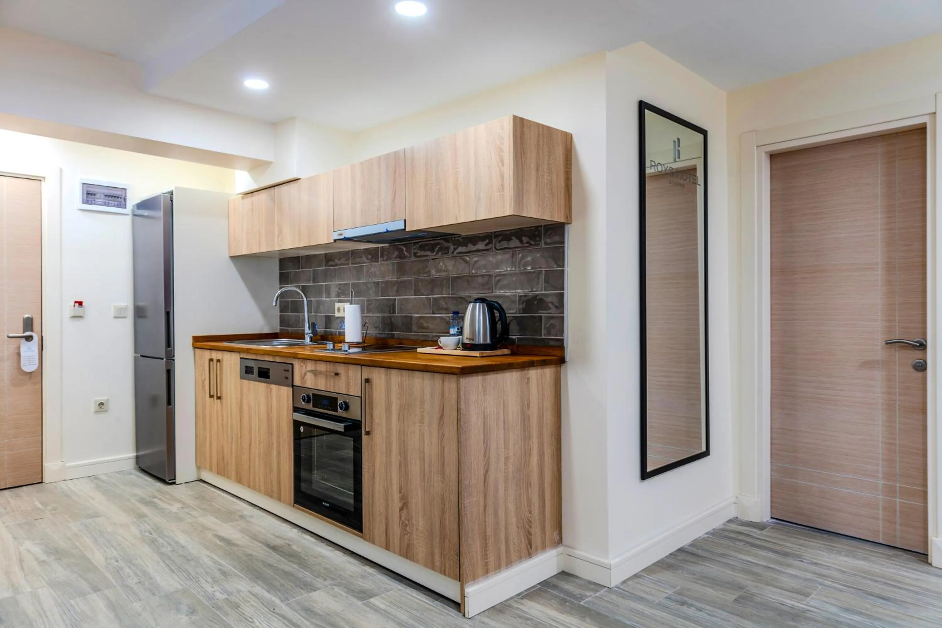 Kitchen or kitchenette in Roys Hotel & Suites