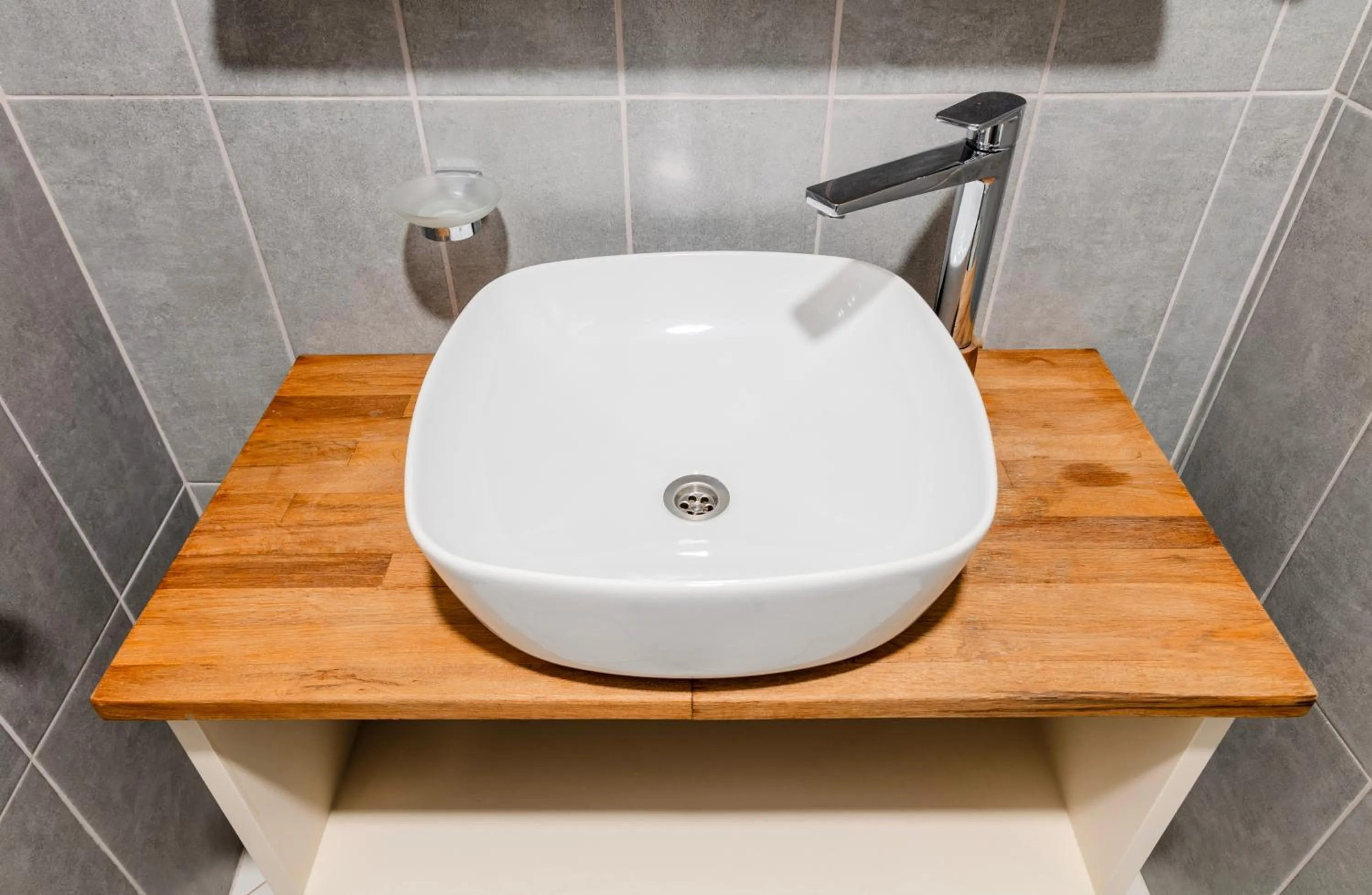 Bathroom in Roys Hotel & Suites
