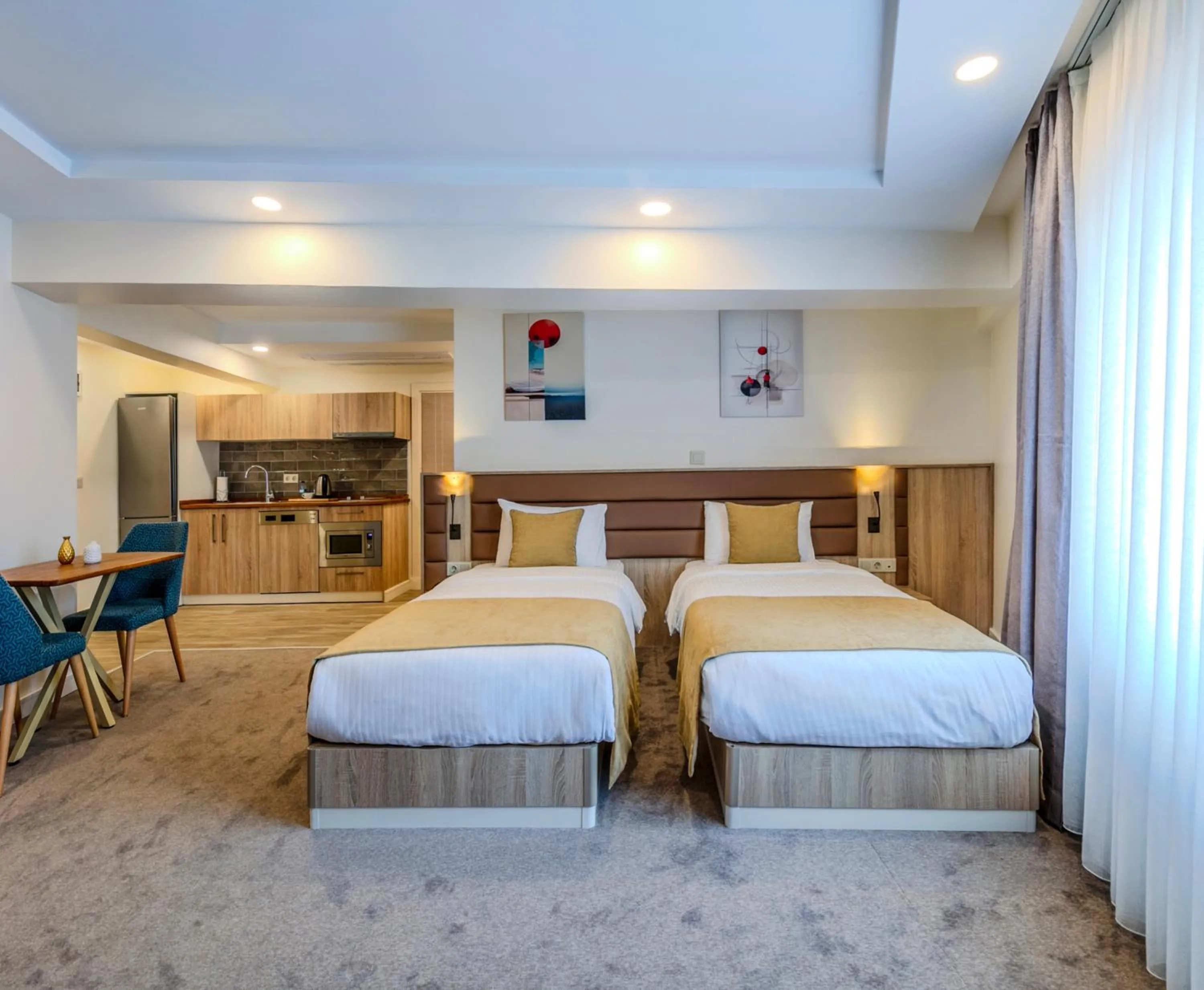 Bed in Roys Hotel & Suites