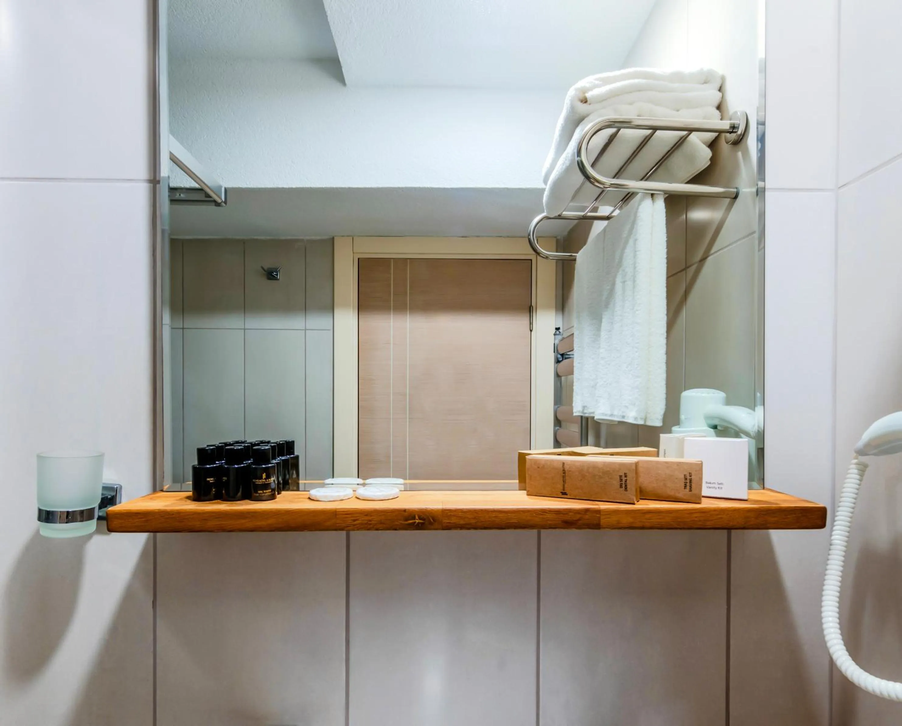 Bathroom in Roys Hotel & Suites