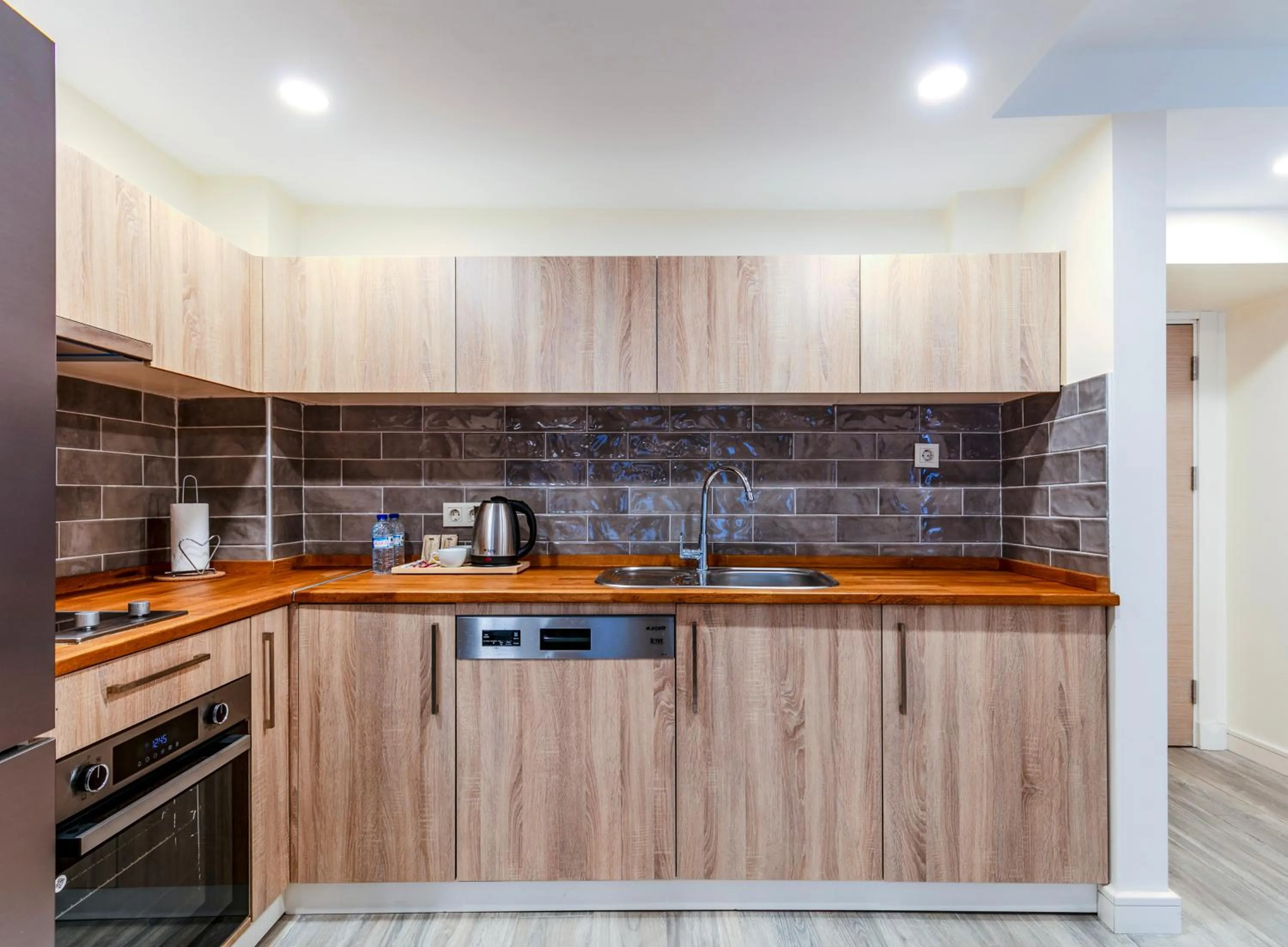 Kitchen or kitchenette in Roys Hotel & Suites