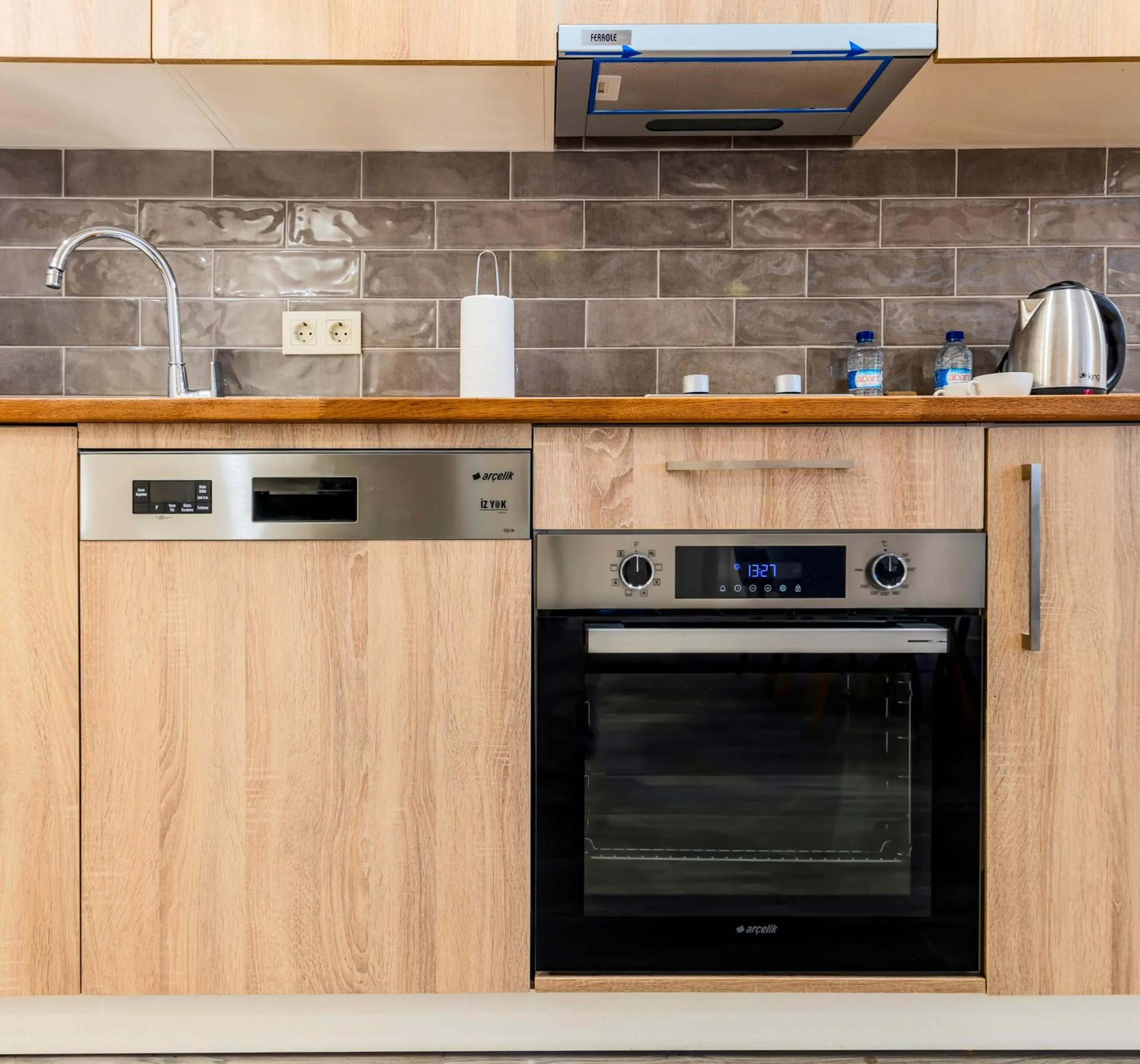 Kitchen or kitchenette in Roys Hotel & Suites