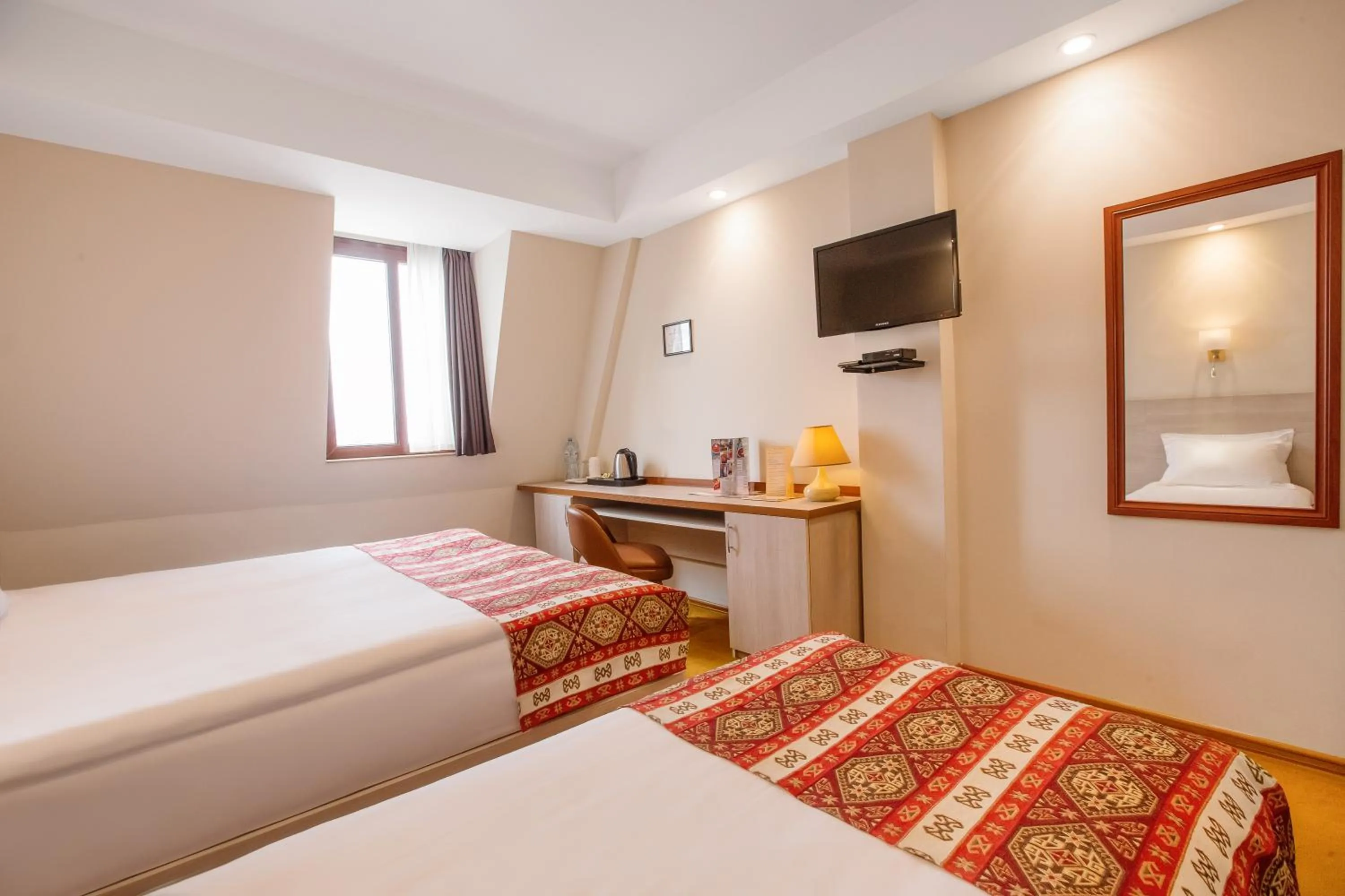 Bed in Urban Boutique Hotel