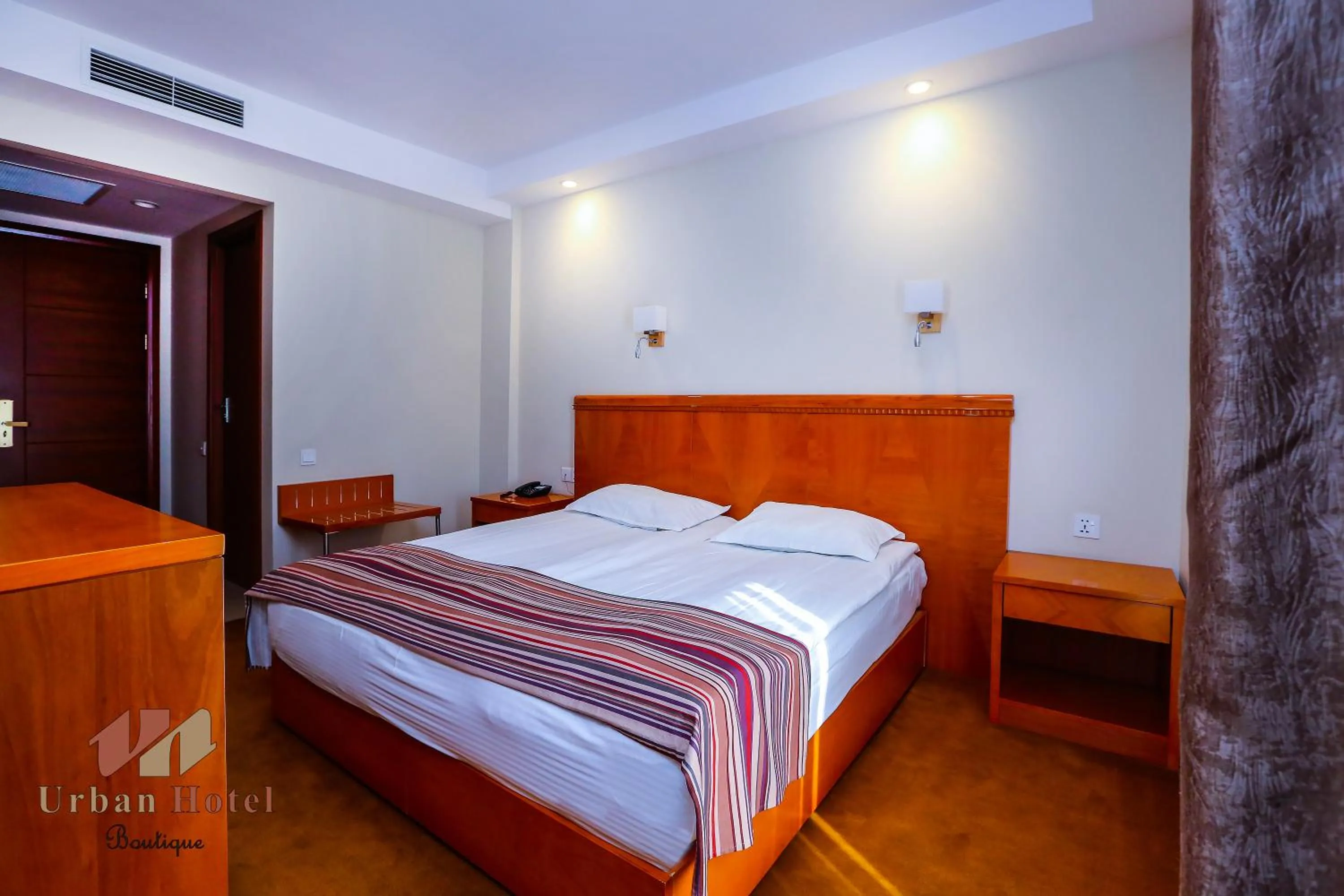 Photo of the whole room, Bed in Urban Boutique Hotel