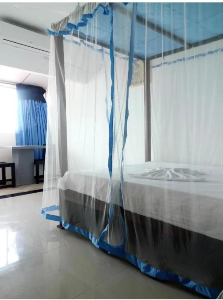 Bed in Rainbow Beach Hotel