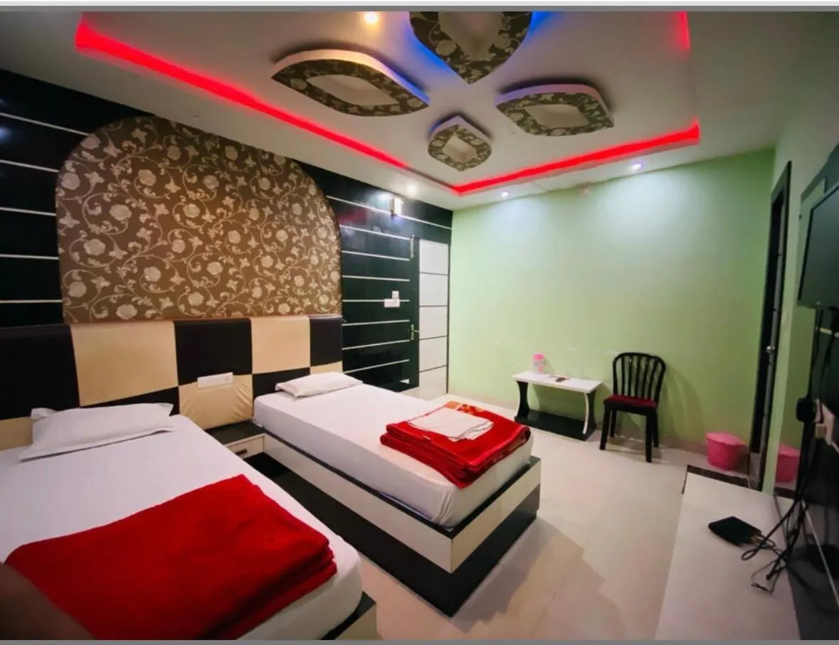 Bed in Hotel Basant Vihar International