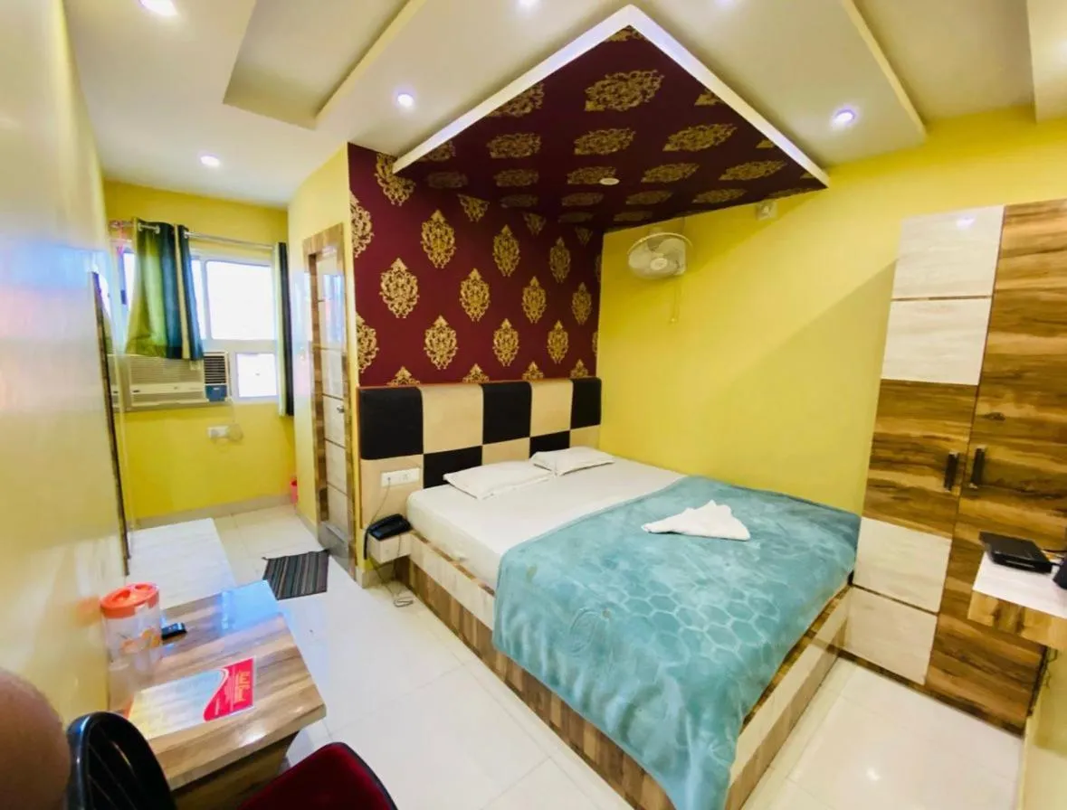 Bed in Hotel Basant Vihar International
