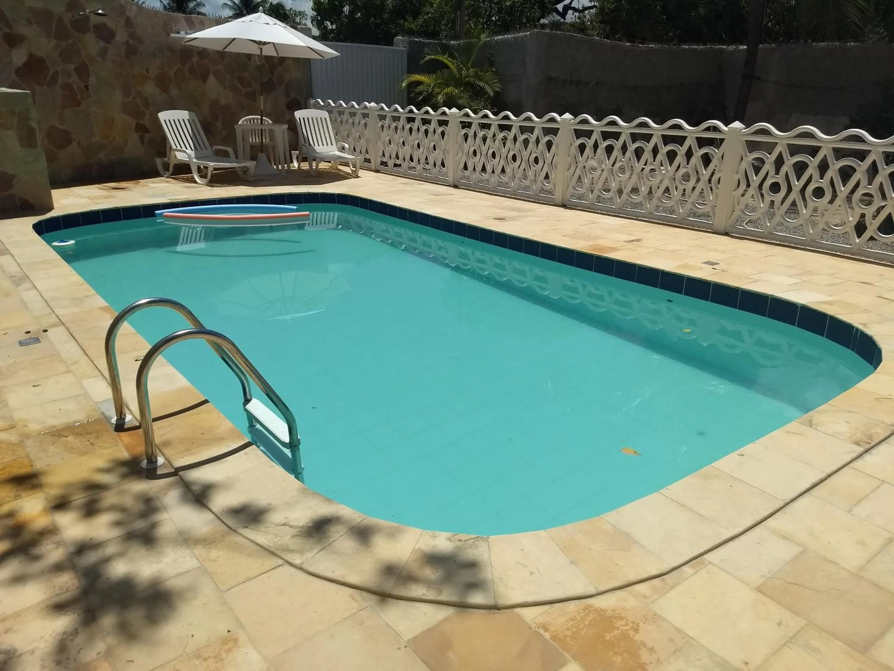 Swimming pool in Pousada Santa Fé