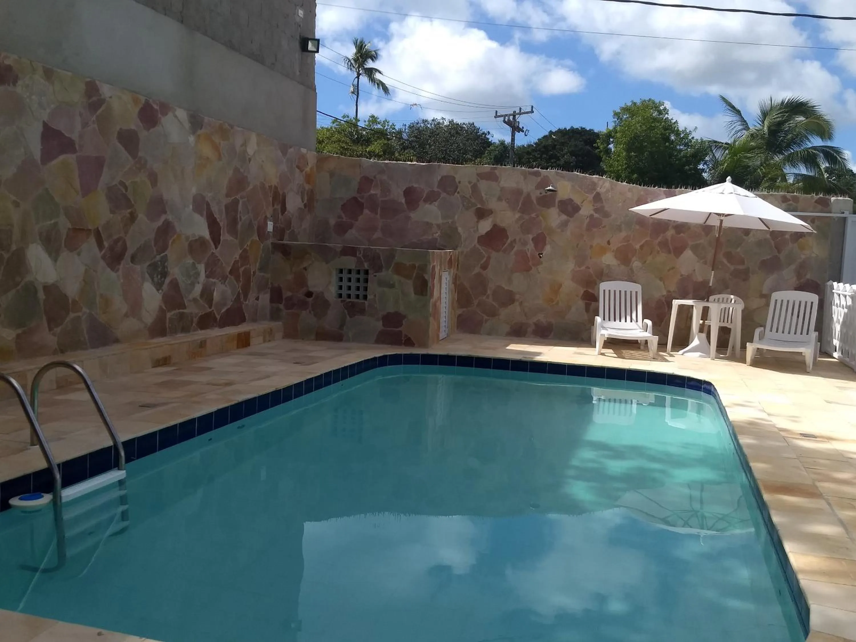 Swimming pool in Pousada Santa Fé