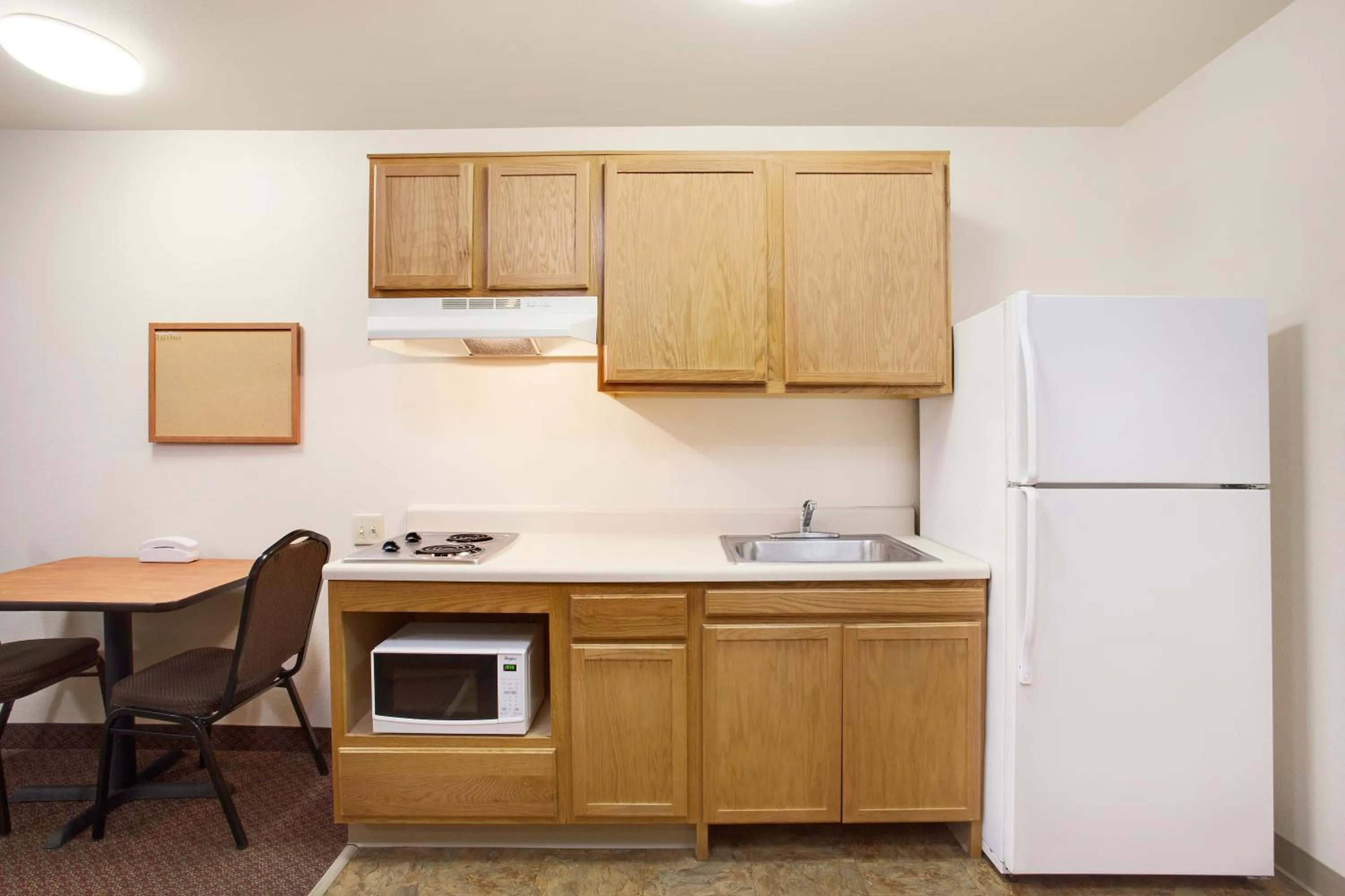 kitchen in WoodSpring Suites San Antonio North Live Oak I-35