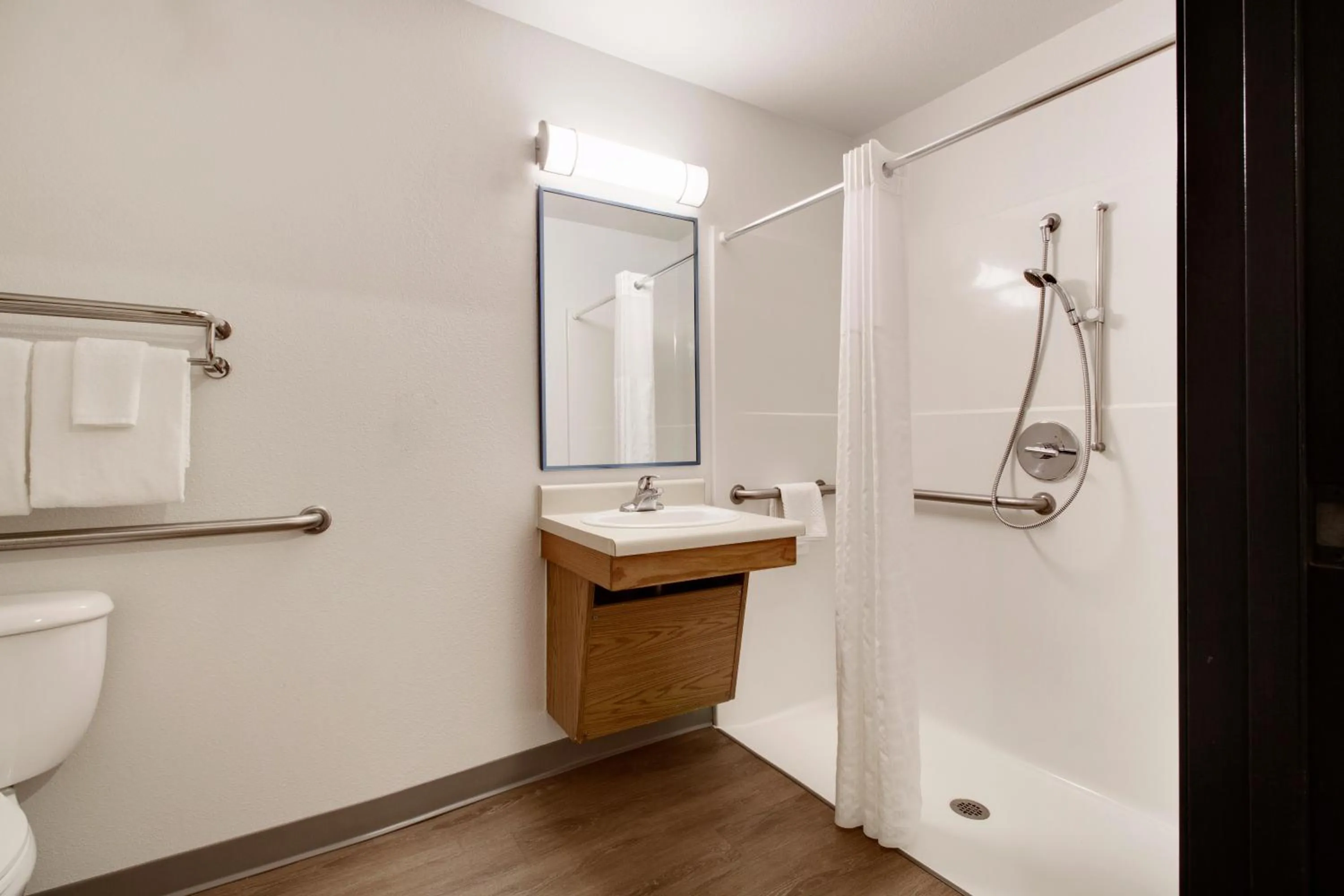 Bathroom in WoodSpring Suites Houston Westchase