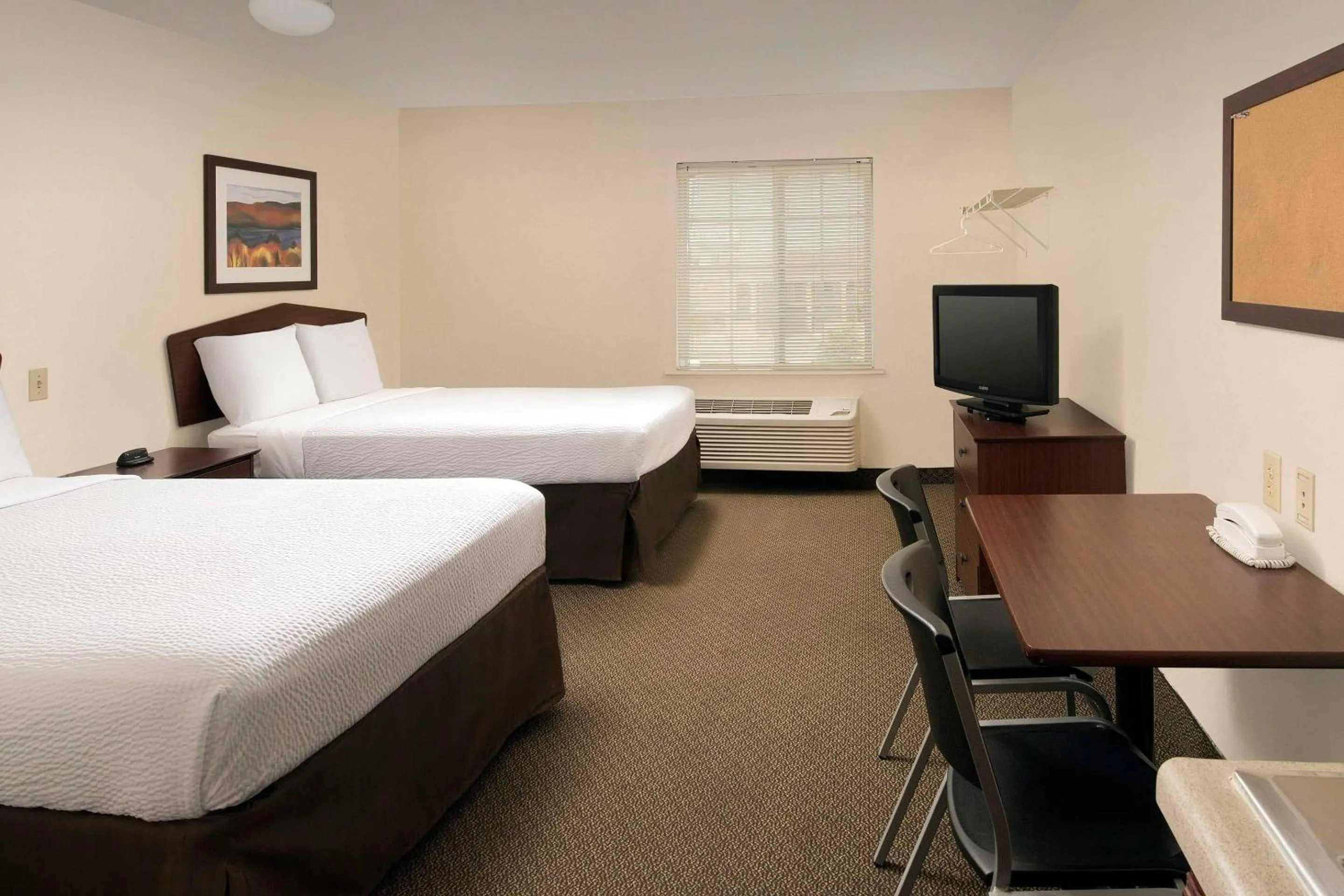 Bedroom, Bed in WoodSpring Suites San Antonio Fort Sam