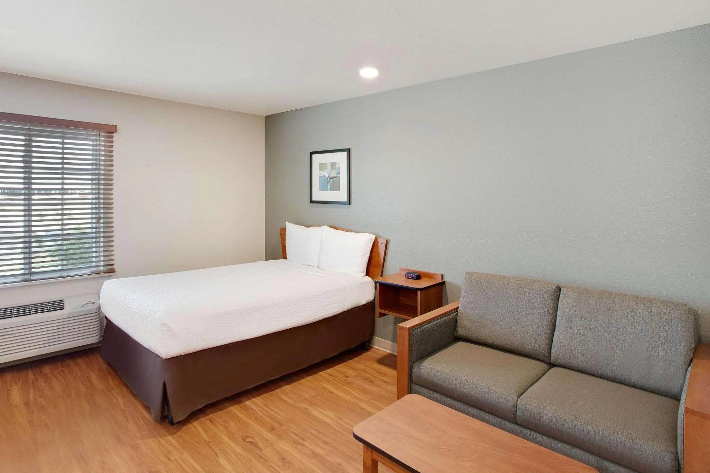 Photo of the whole room, Bed in WoodSpring Suites College Station