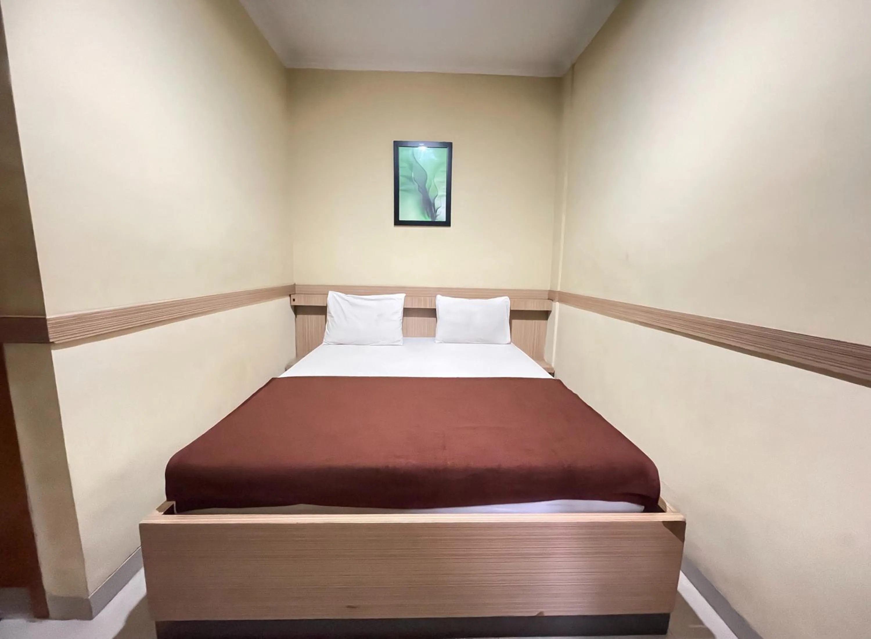 Bed in Hotel Cemara Hijau