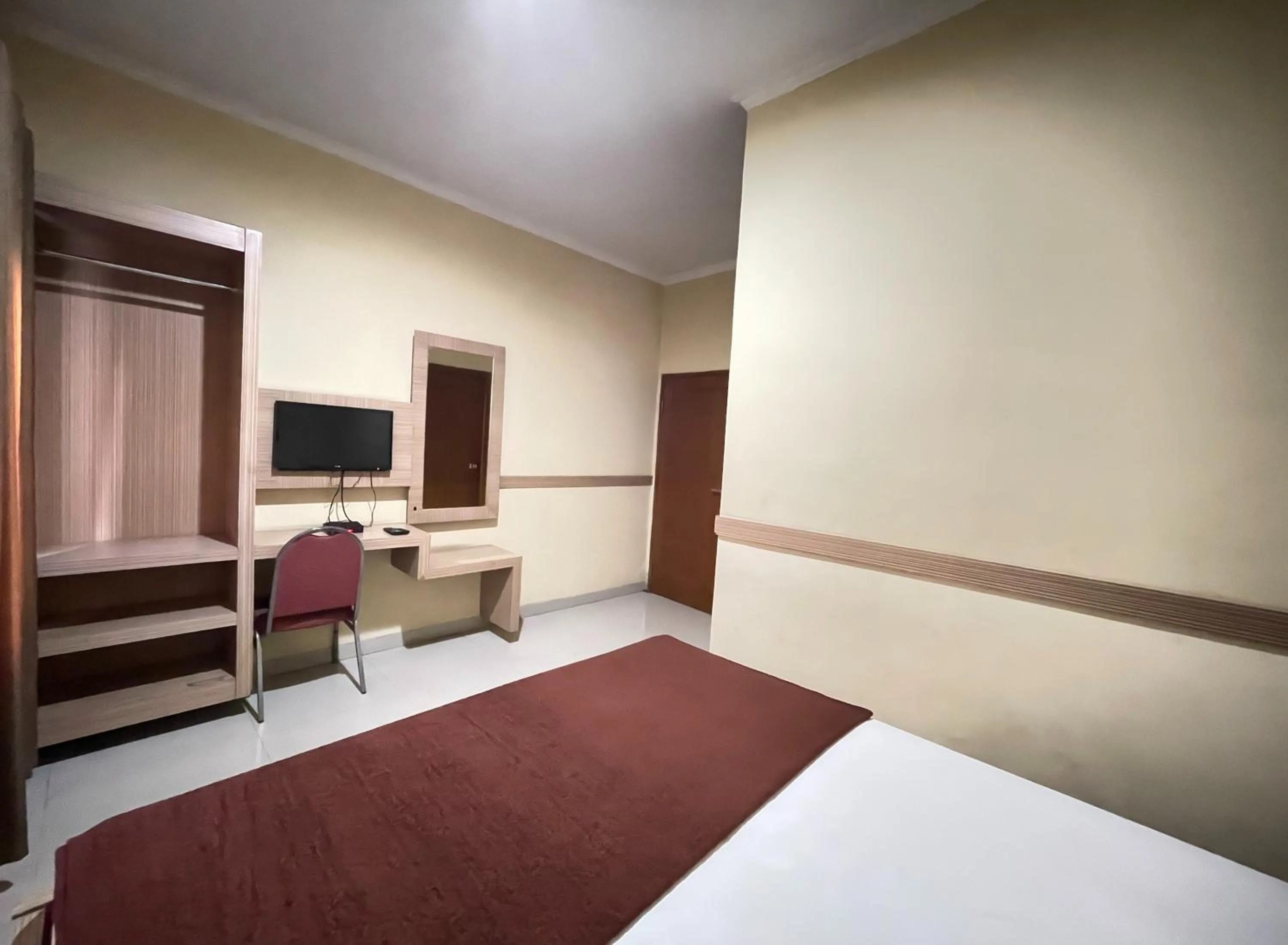 Bed in Hotel Cemara Hijau