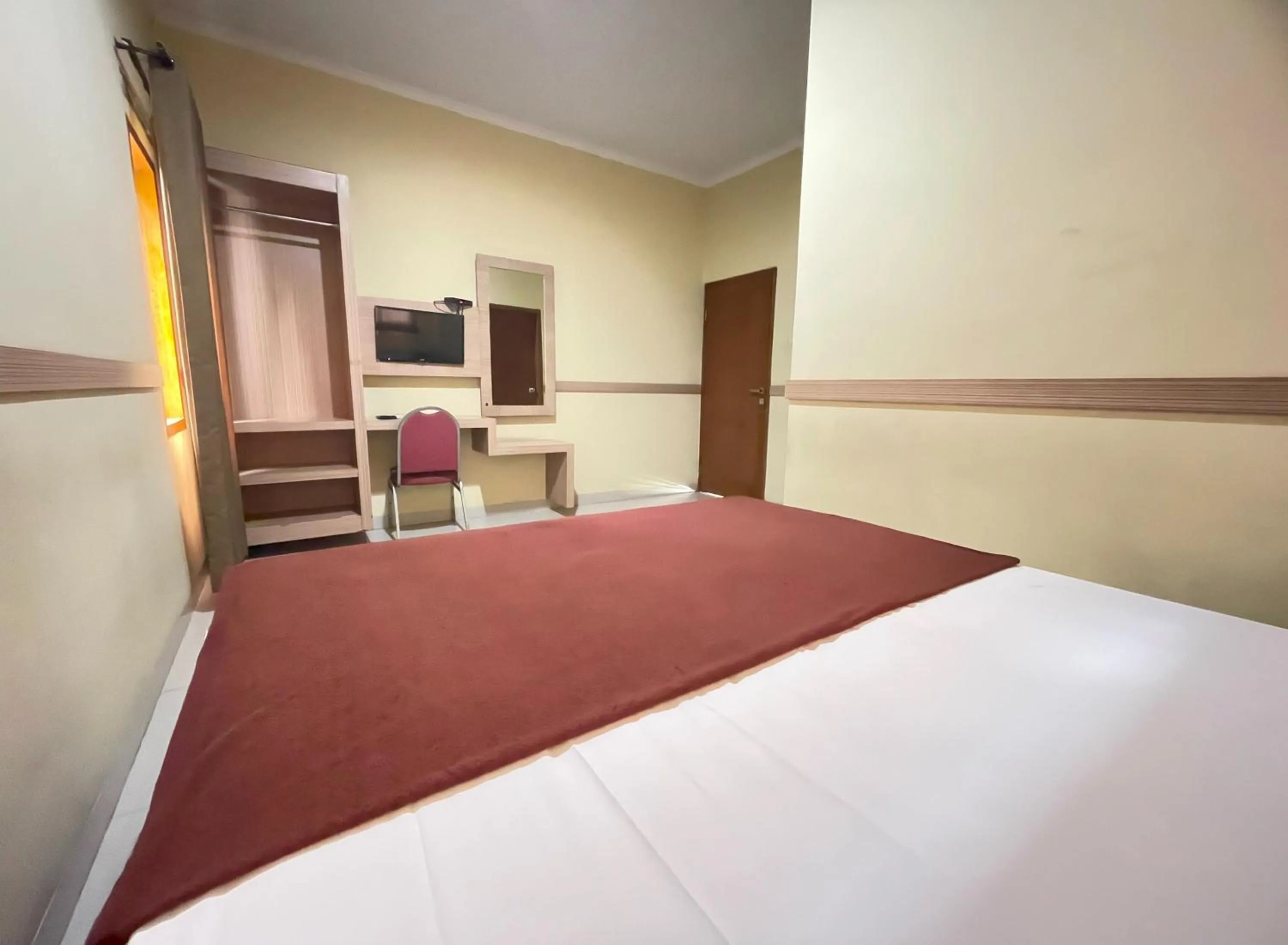 Bed in Hotel Cemara Hijau