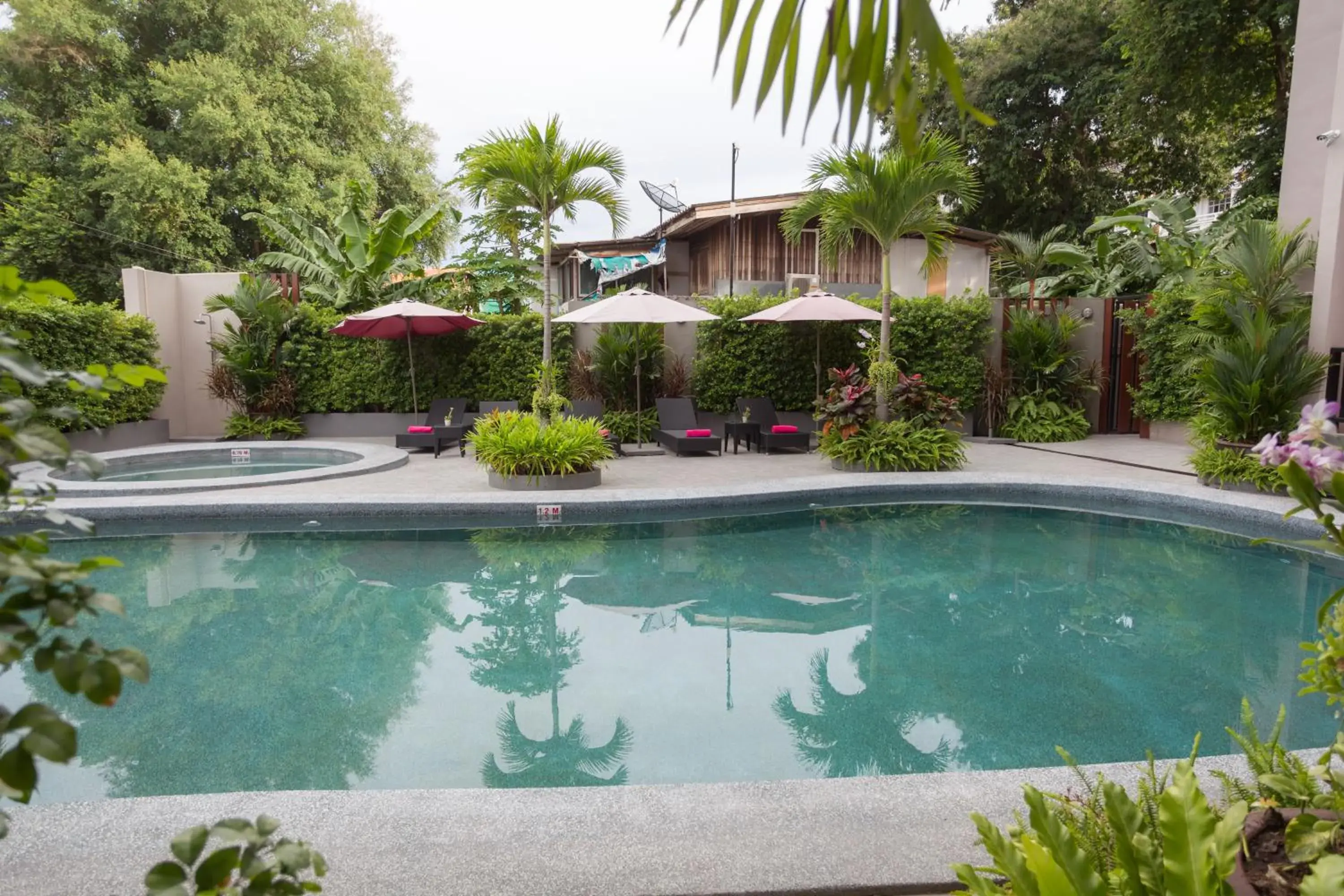 Swimming pool, Property Building in Golden Tulip Essential Pattaya