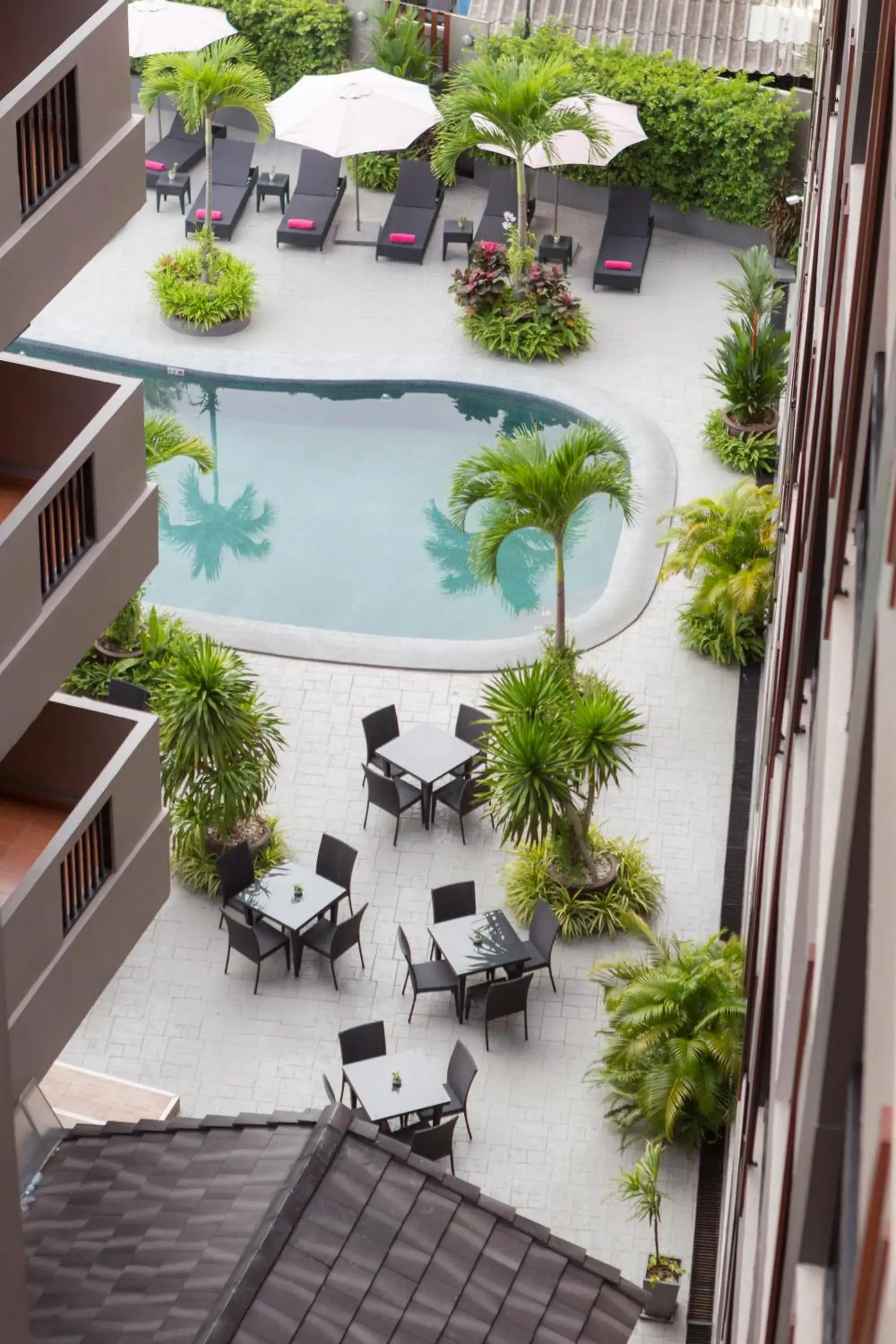 Swimming pool, Patio/Outdoor Area in Golden Tulip Essential Pattaya