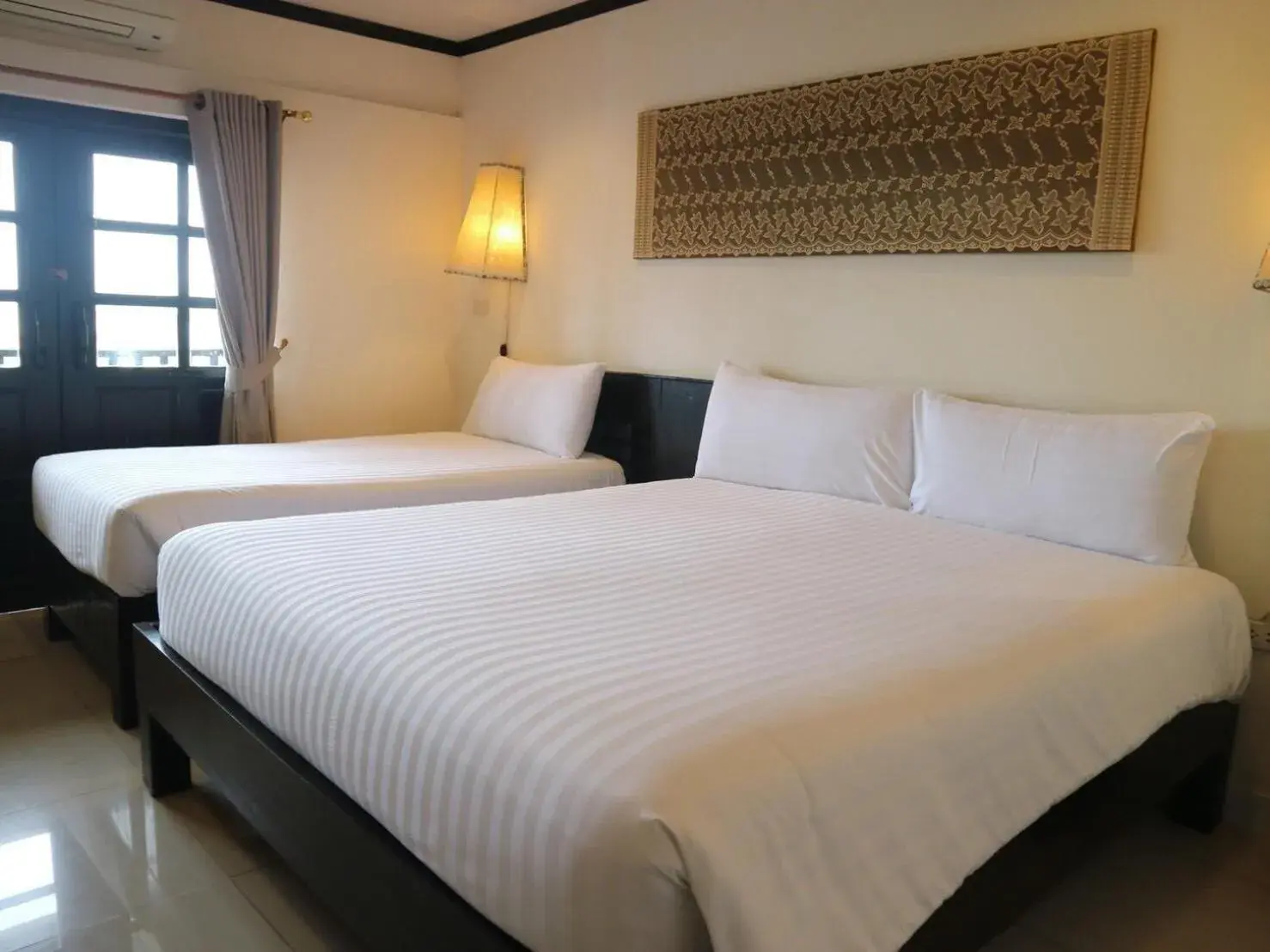 Bed in Golden Tulip Essential Pattaya