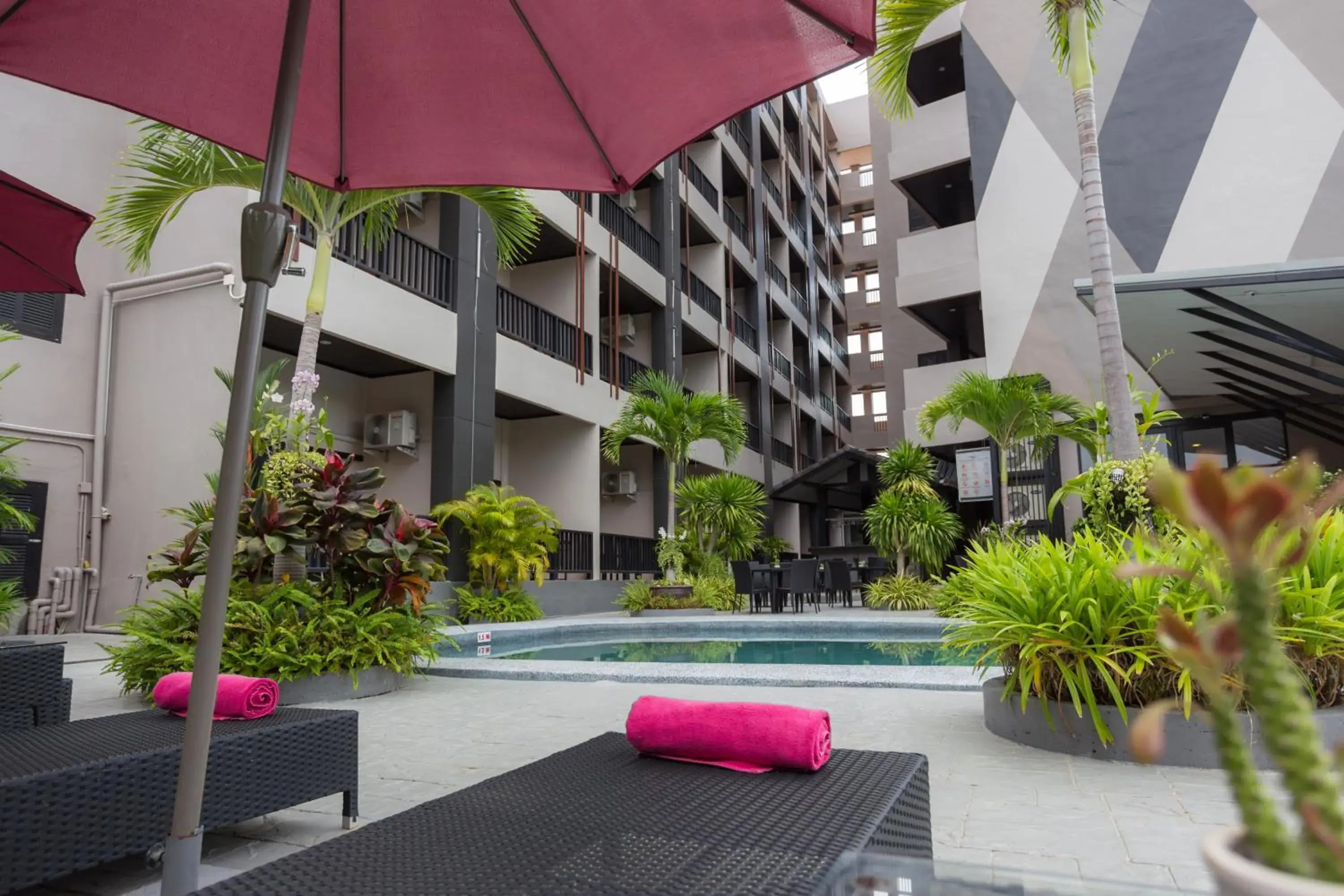 Swimming pool, Patio/Outdoor Area in Golden Tulip Essential Pattaya