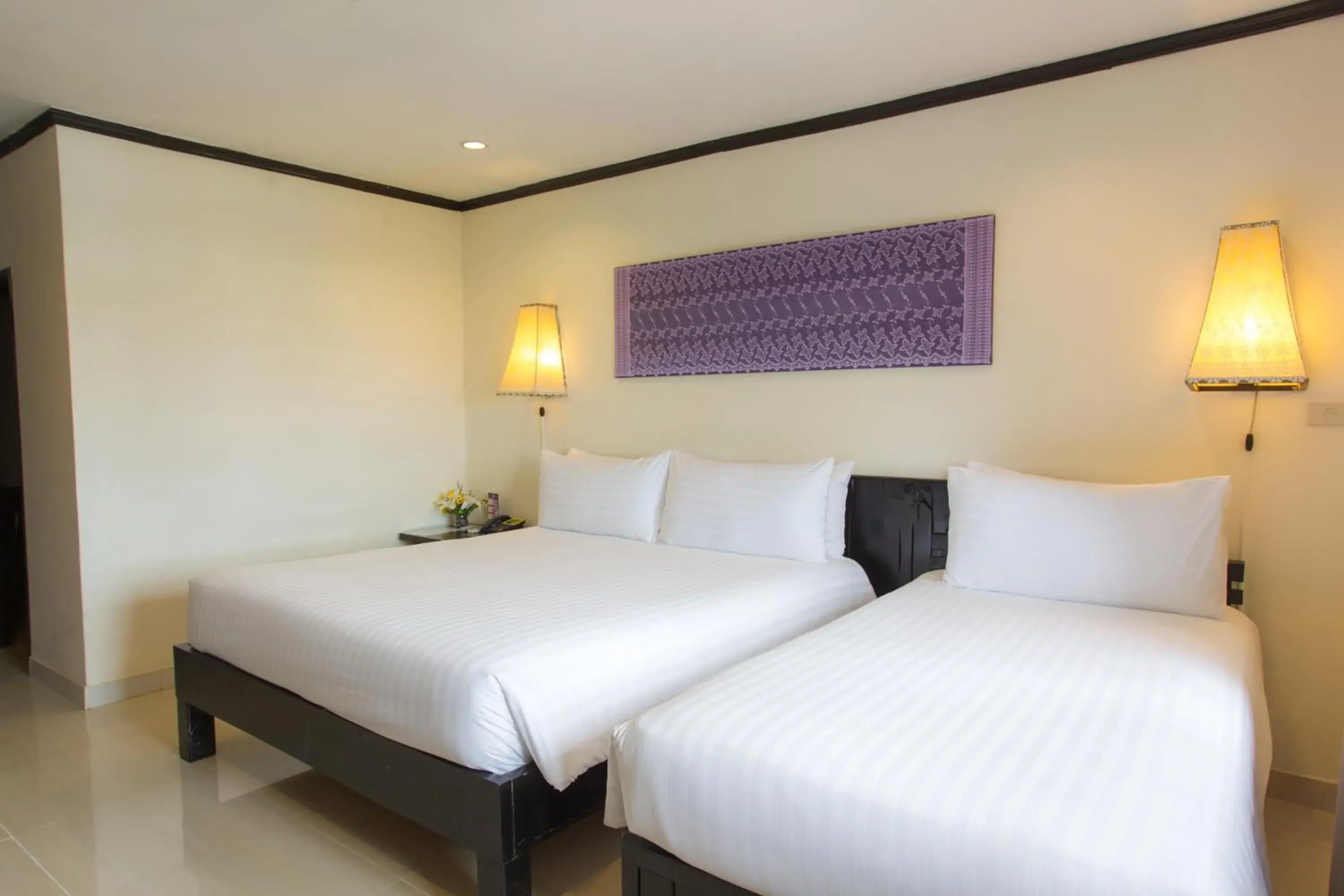 Photo of the whole room, Bed in Golden Tulip Essential Pattaya