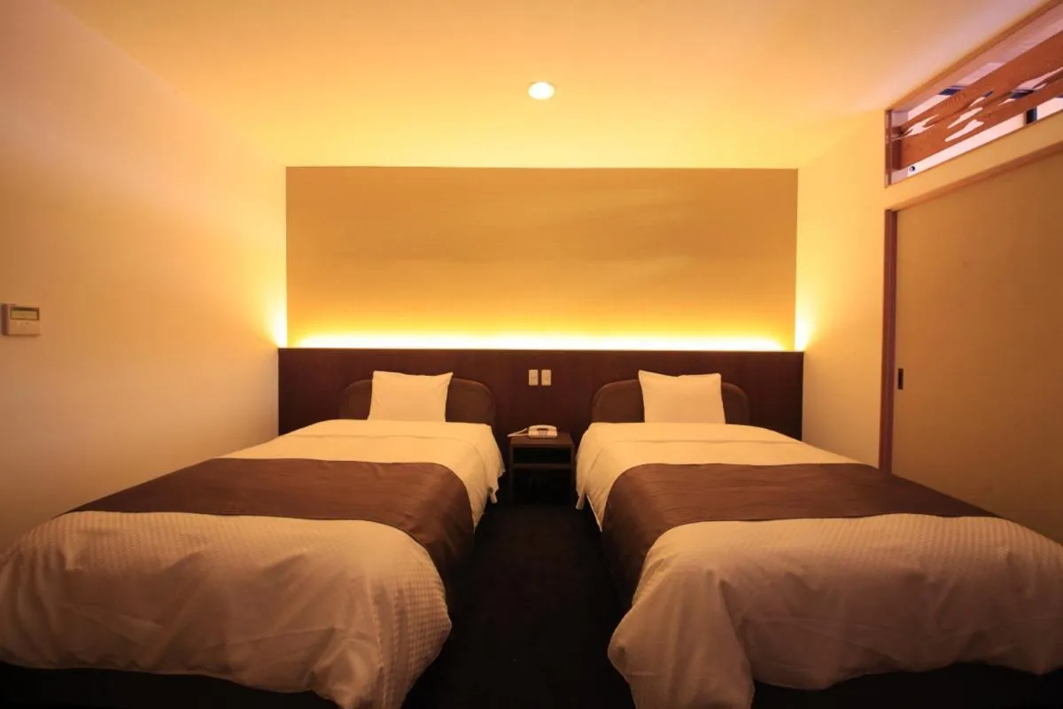 Bed in Nanpeidai Onsen Hotel