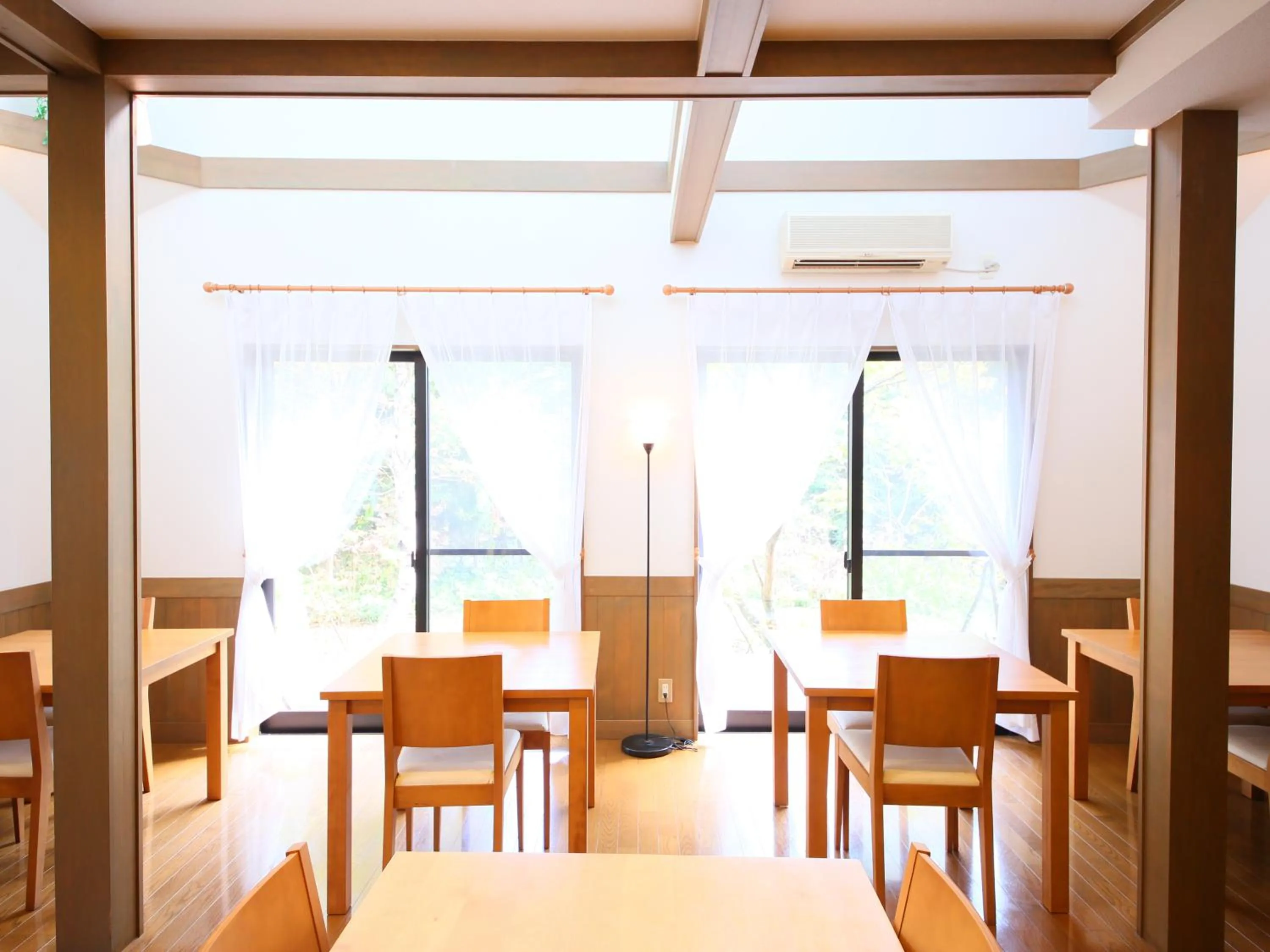 Communal lounge/ TV room in Anise Garden