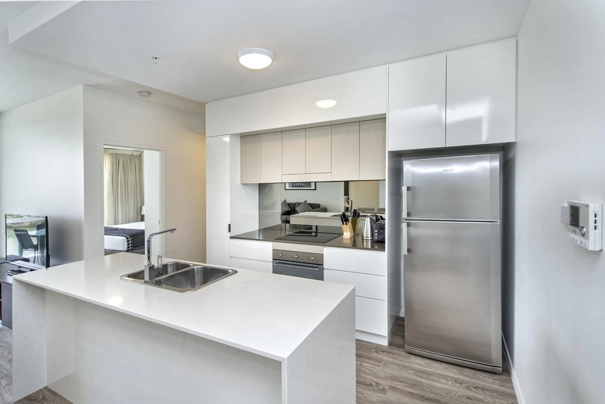 Kitchen or kitchenette in Empire Apartment Hotel Rockhampton