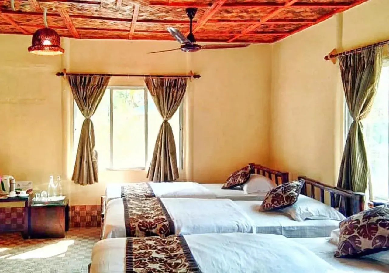 Bed in Sunderban Tiger Camp Bed in Sunderban Tiger Camp