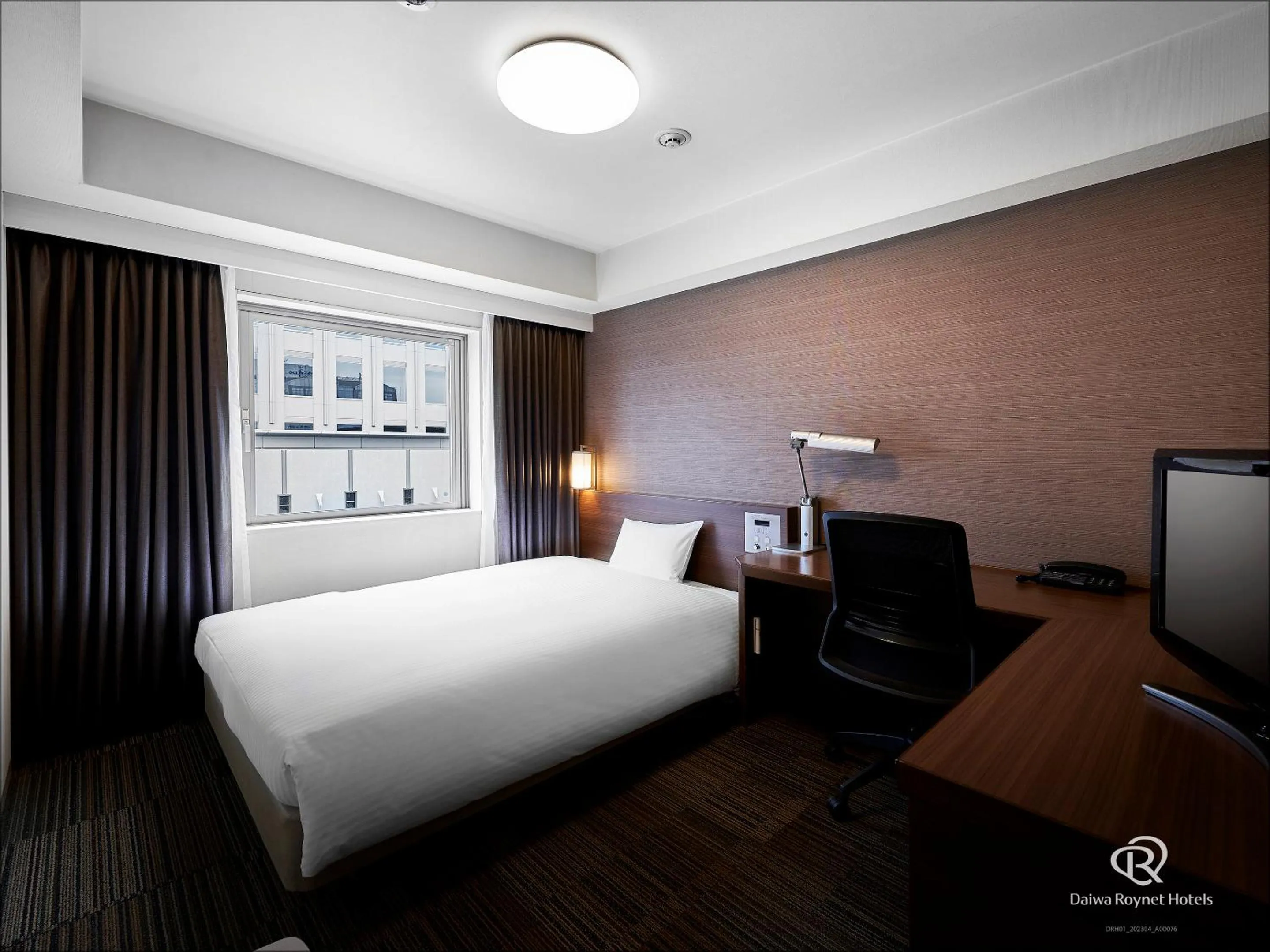 Bed in Daiwa Roynet Hotel Sendai