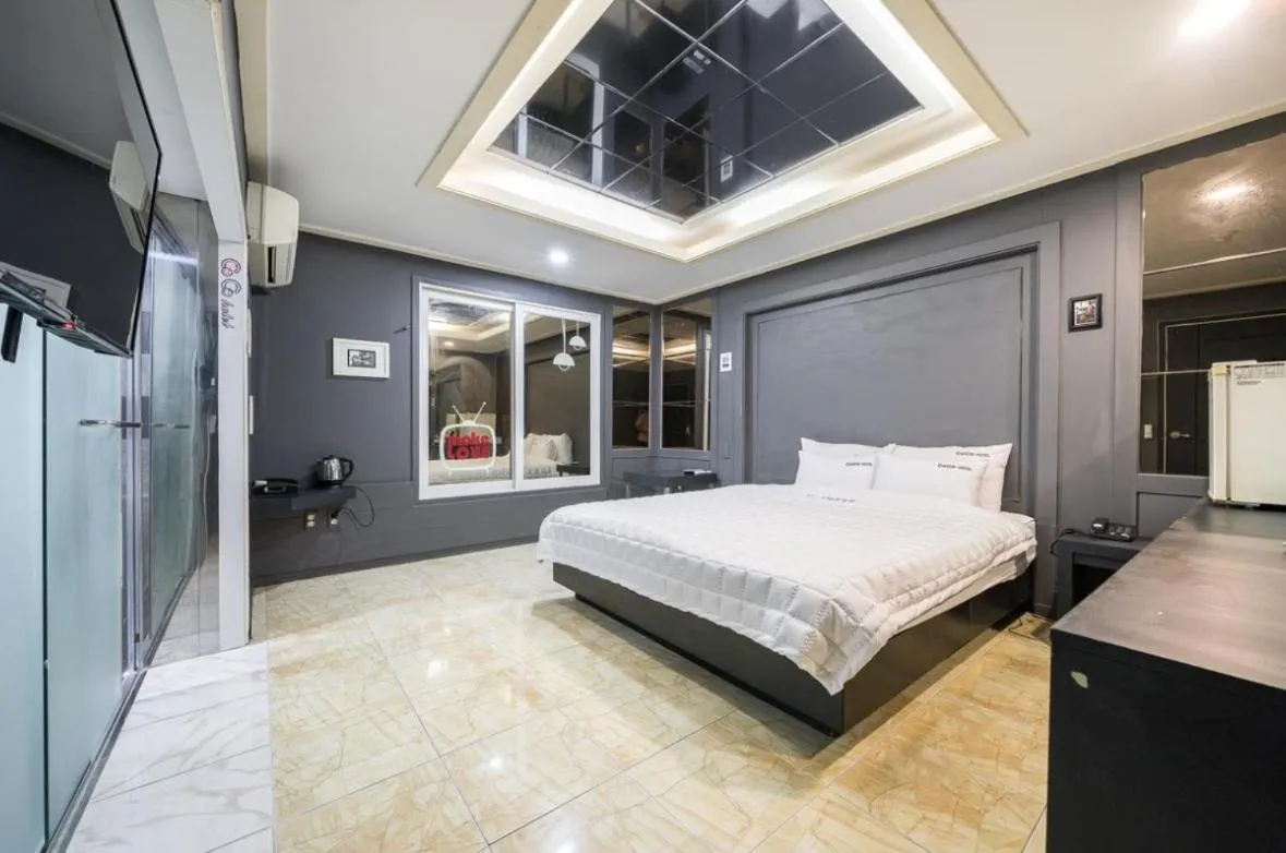 Bed in Songjeong Coco Hotel