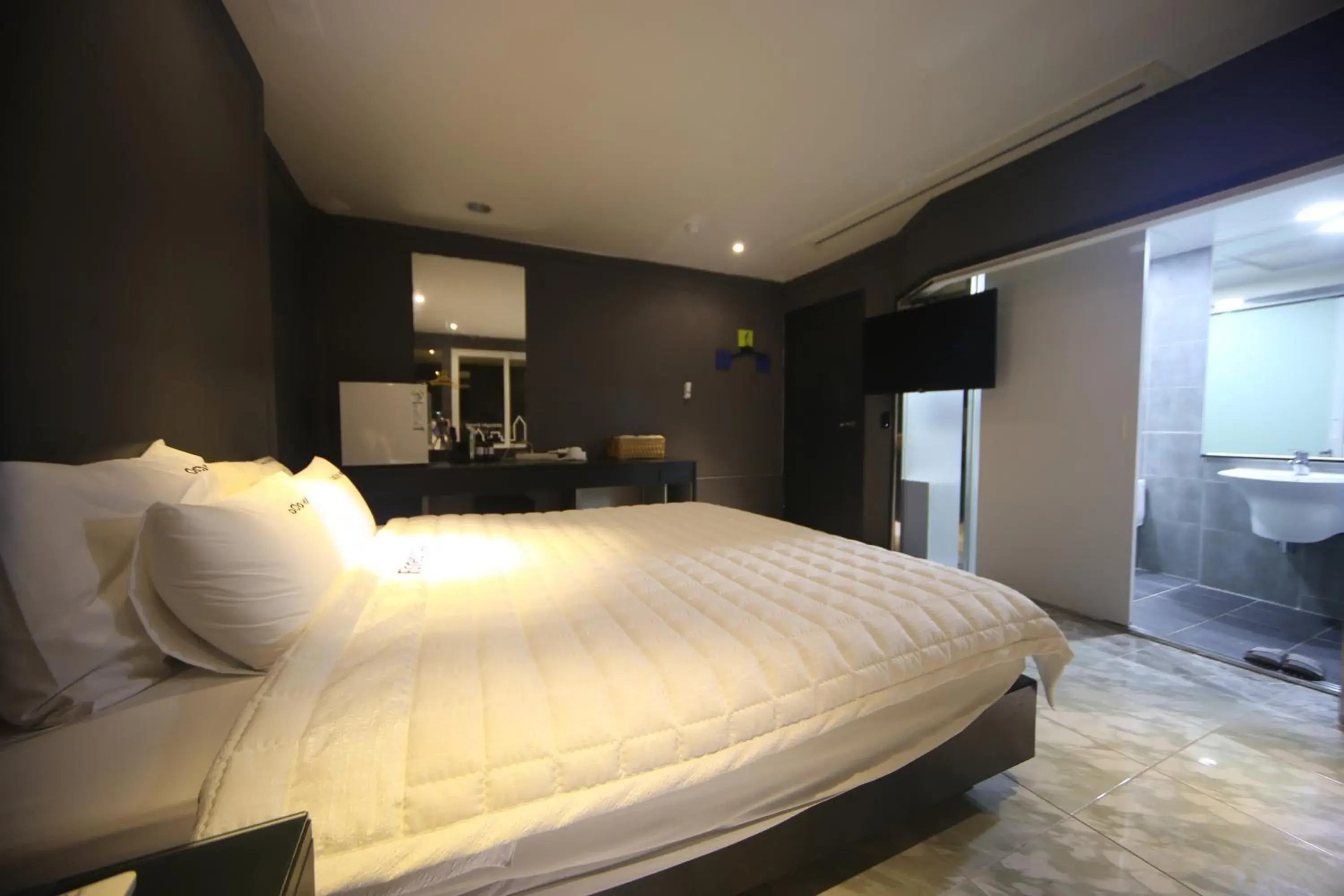 Bed in Songjeong Coco Hotel Bed in Songjeong Coco Hotel