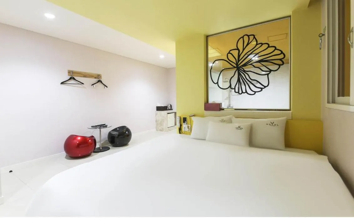 Bed in Songjeong V Hotel