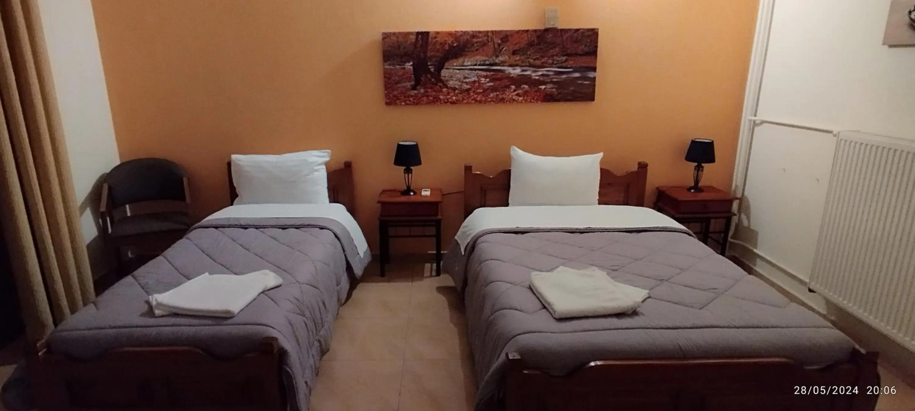 Bed in IZEΛA Hotel