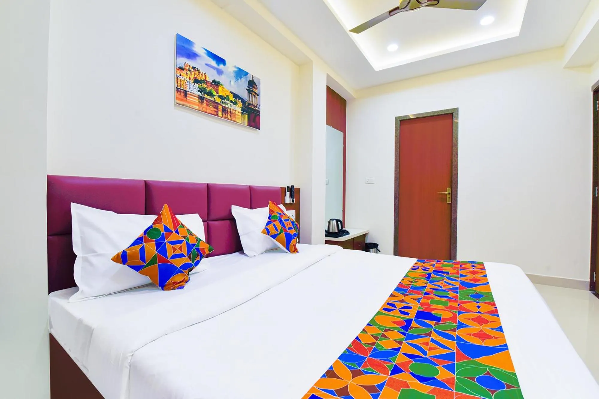 Bed in FabHotel Samrat Regency