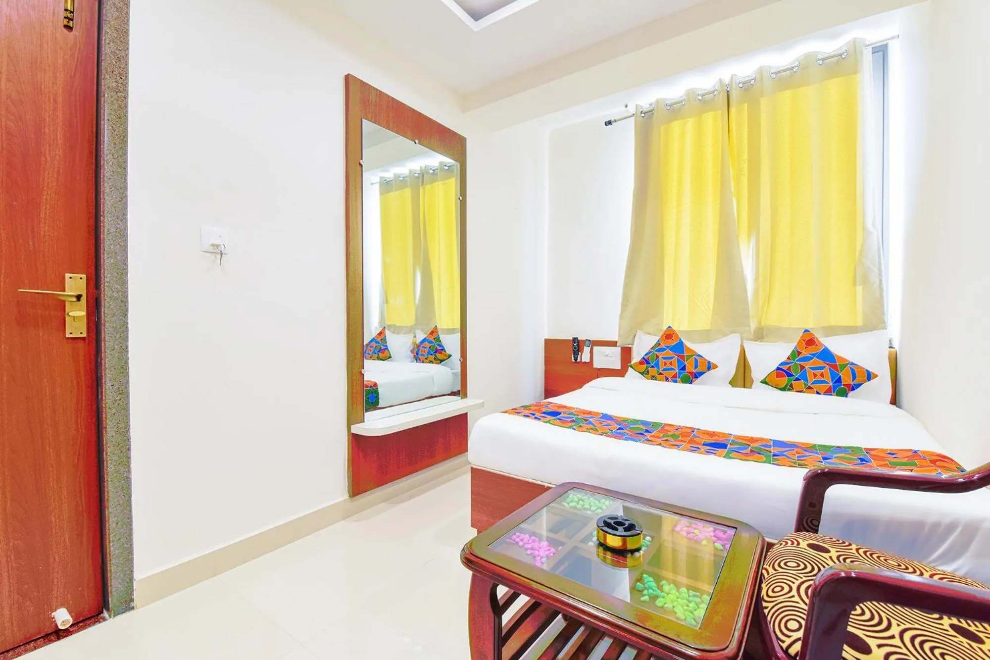 Bed in FabHotel Samrat Regency