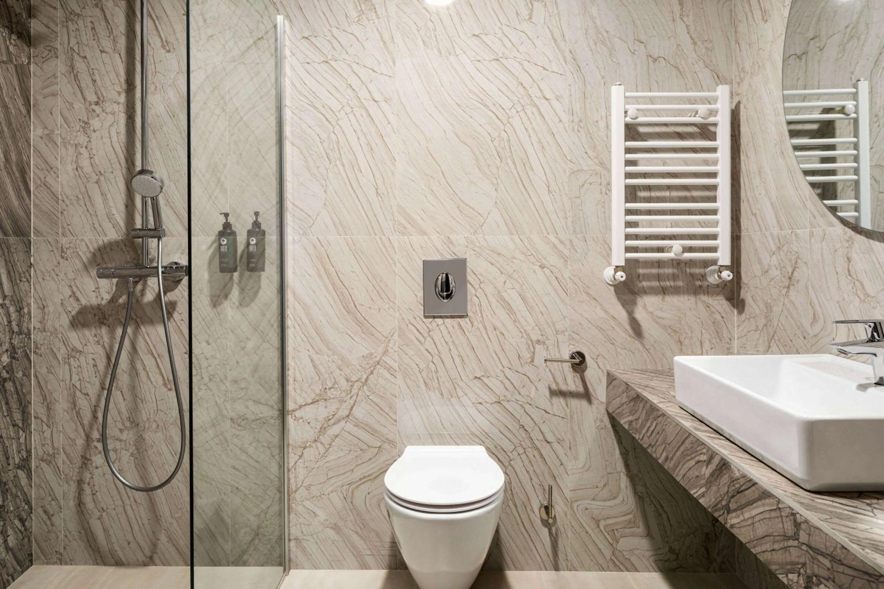 Bathroom in Ramada by Wyndham Bucharest Otopeni Airport