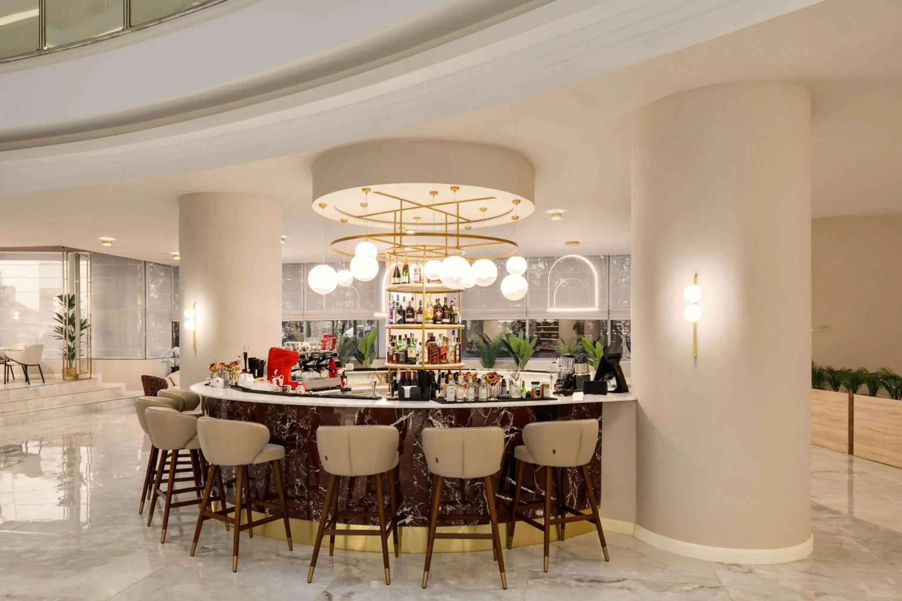 Lounge or bar in Ramada by Wyndham Bucharest Otopeni Airport Lounge or bar in Ramada by Wyndham Bucharest Otopeni Airport