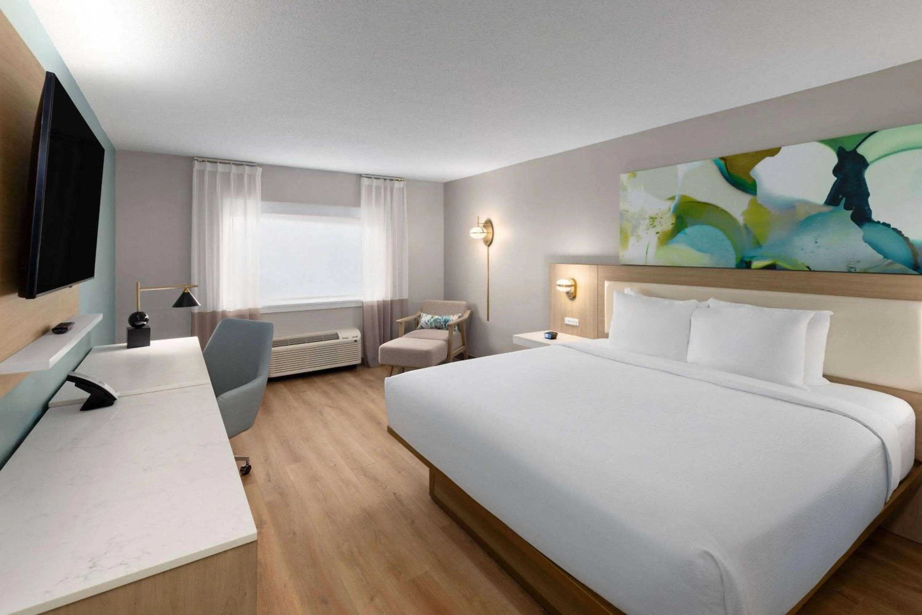 Photo of the whole room, Bed in Wyndham Garden Louisville KY